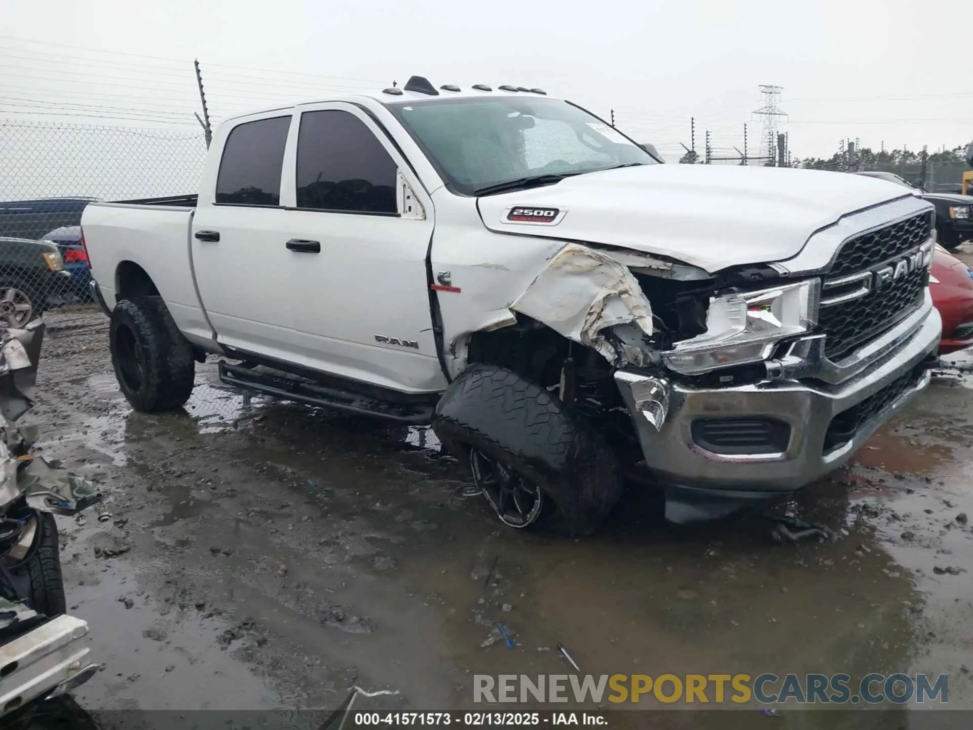 1 Photograph of a damaged car 3C6UR5CL0LG280648 RAM 2500 2020