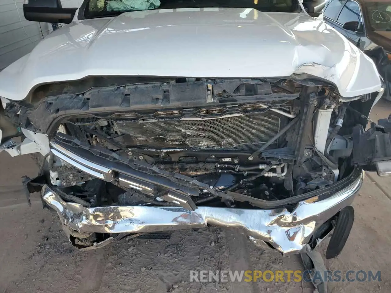 11 Photograph of a damaged car 3C6UR5CL7LG172687 RAM 2500 2020