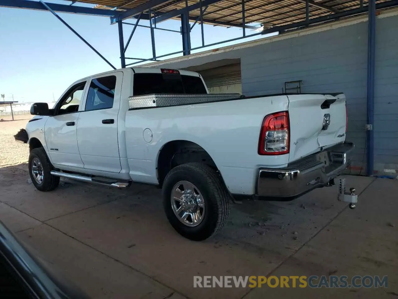 2 Photograph of a damaged car 3C6UR5CL7LG172687 RAM 2500 2020