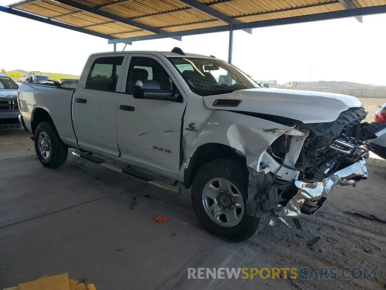 4 Photograph of a damaged car 3C6UR5CL7LG172687 RAM 2500 2020