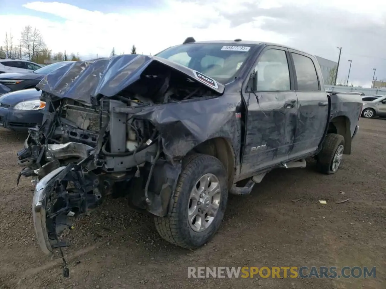 1 Photograph of a damaged car 3C6UR5DJ8LG225104 RAM 2500 2020