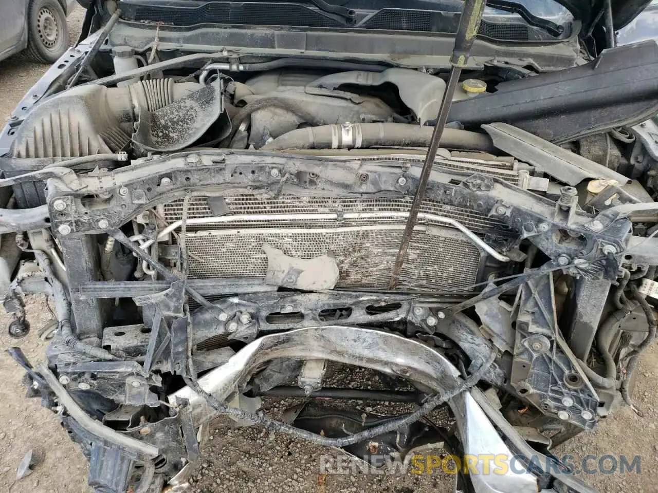 11 Photograph of a damaged car 3C6UR5DJ8LG225104 RAM 2500 2020