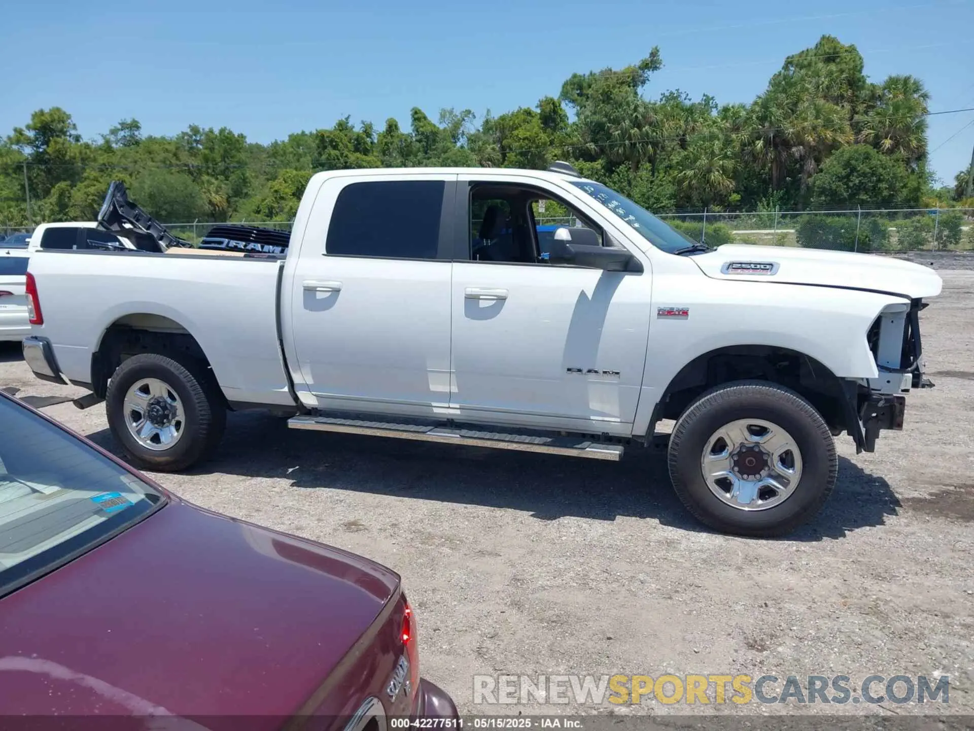14 Photograph of a damaged car 3C6UR5DJ9LG155659 RAM 2500 2020