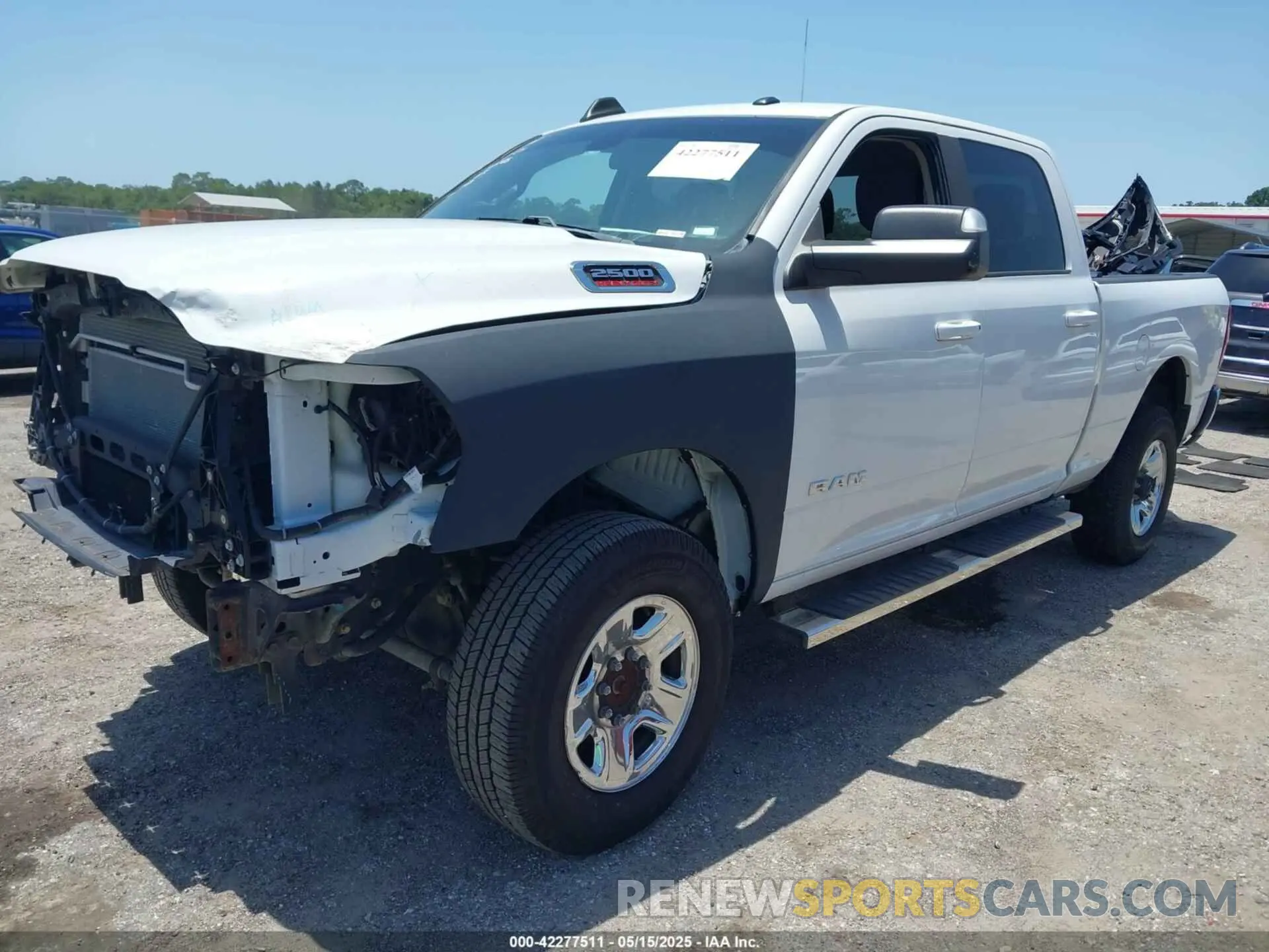 2 Photograph of a damaged car 3C6UR5DJ9LG155659 RAM 2500 2020