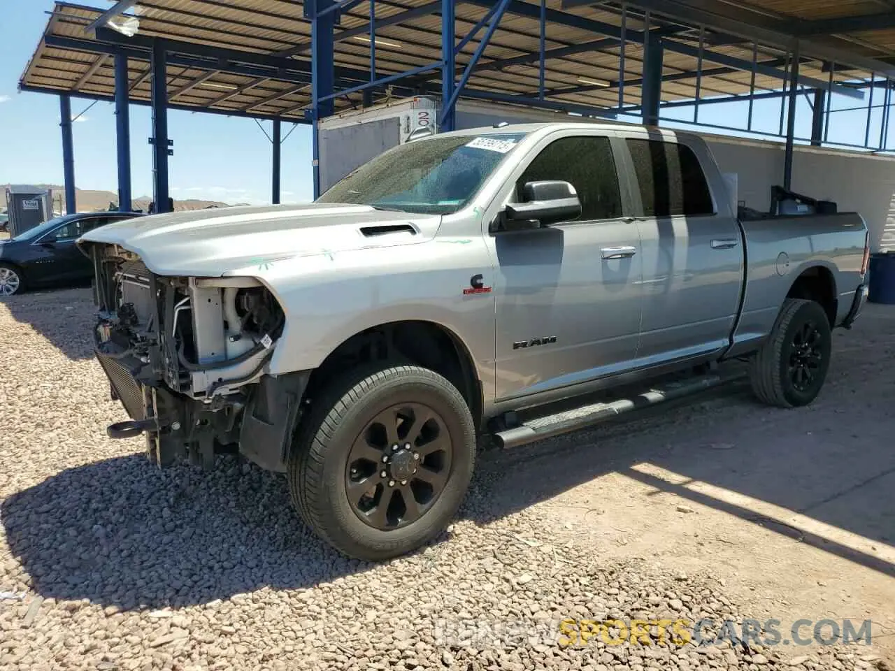 1 Photograph of a damaged car 3C6UR5DL0LG282821 RAM 2500 2020