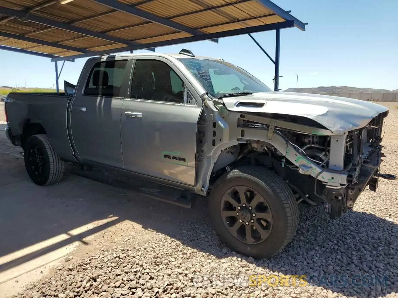 4 Photograph of a damaged car 3C6UR5DL0LG282821 RAM 2500 2020