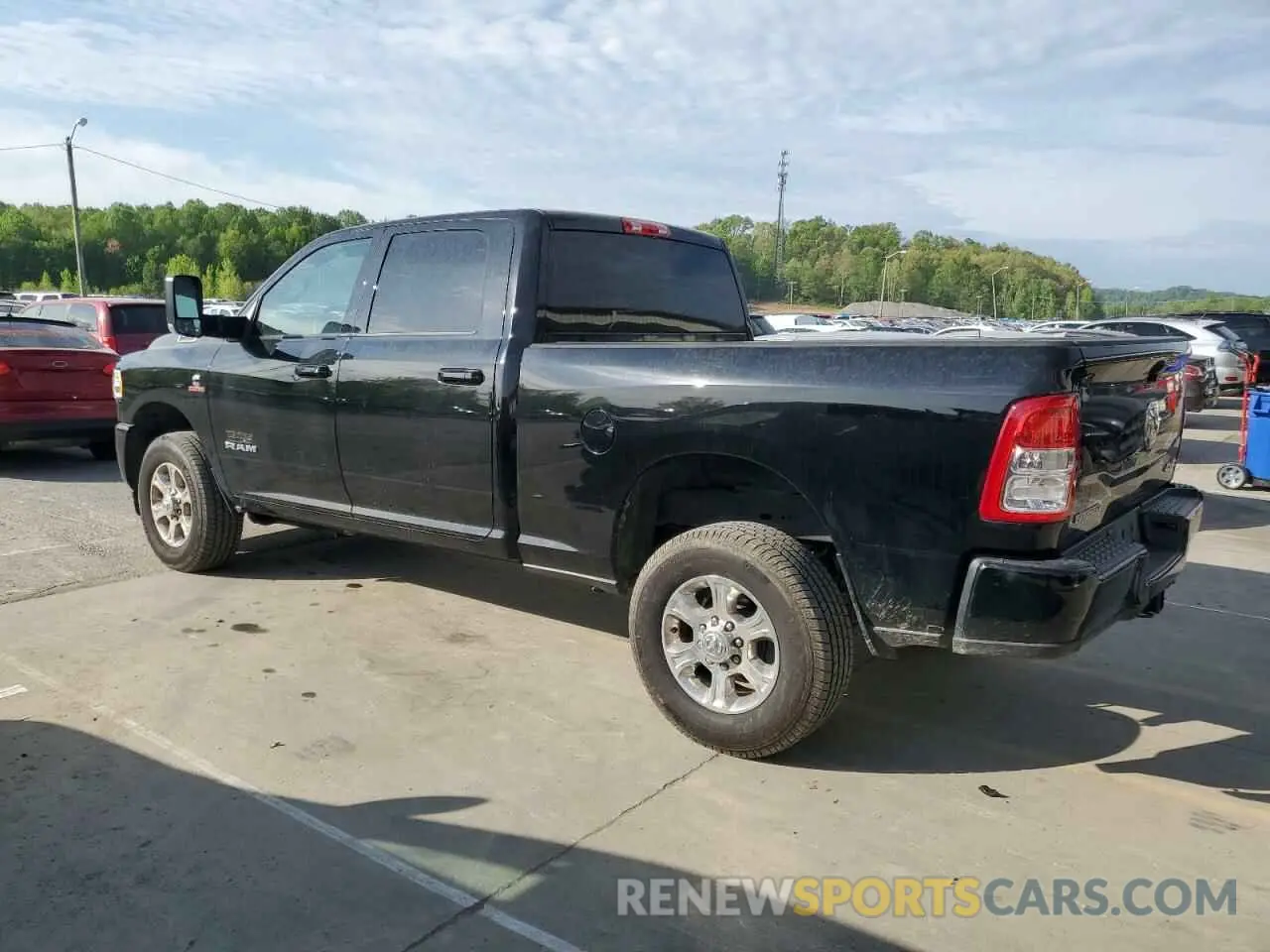 2 Photograph of a damaged car 3C6UR5DL1LG115318 RAM 2500 2020