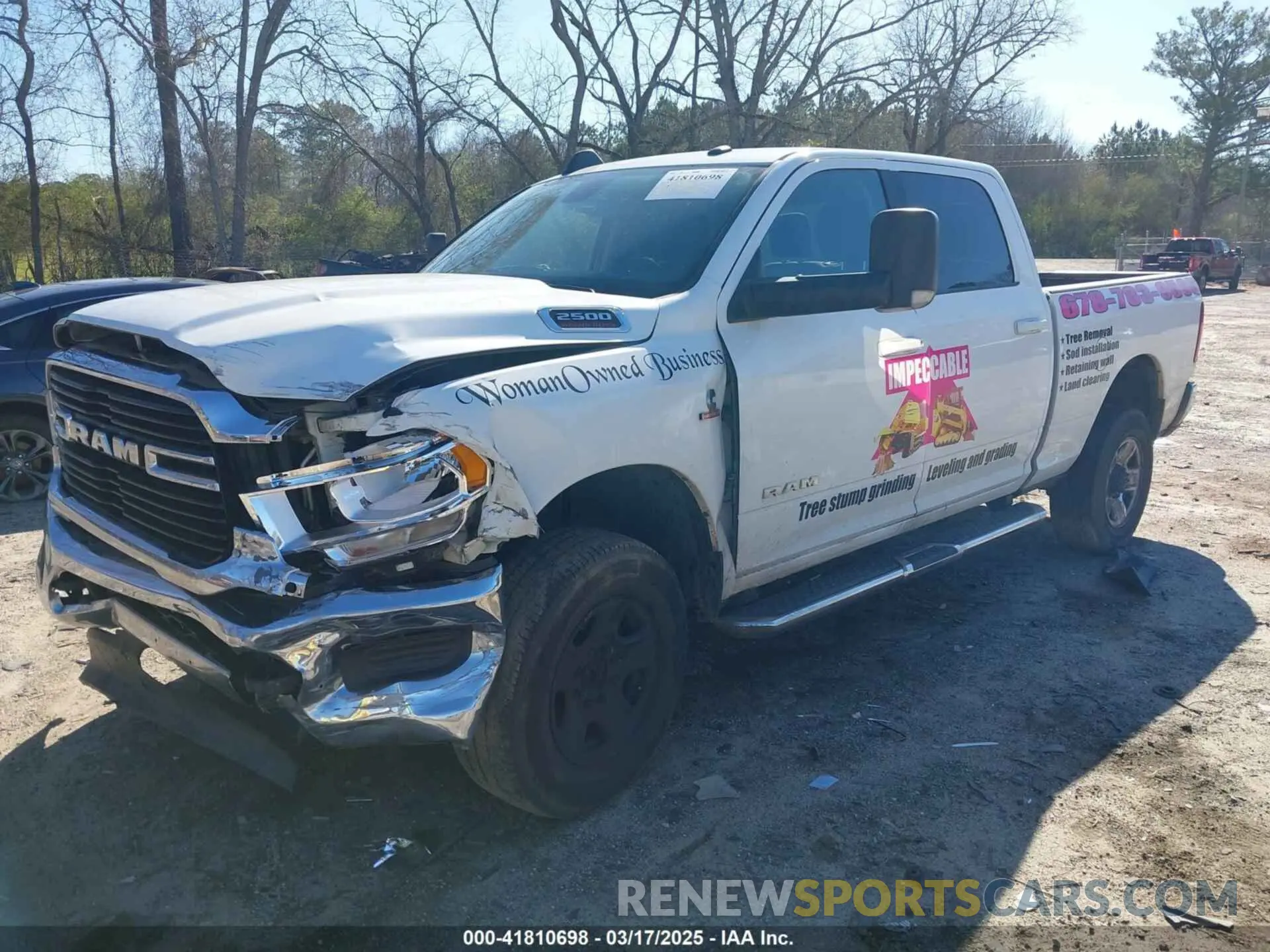 2 Photograph of a damaged car 3C6UR5DL6LG141123 RAM 2500 2020