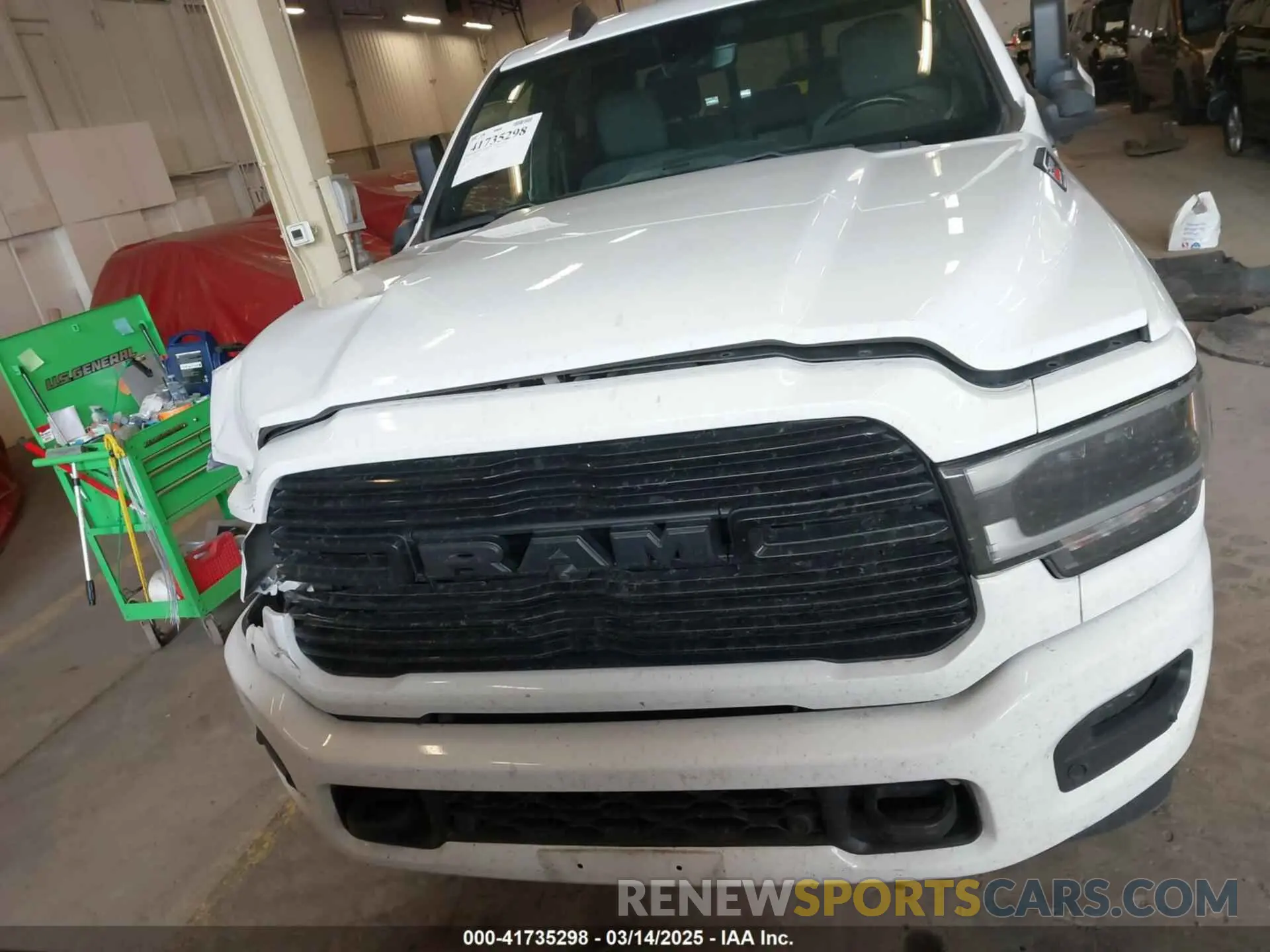 12 Photograph of a damaged car 3C6UR5DL9LG244374 RAM 2500 2020