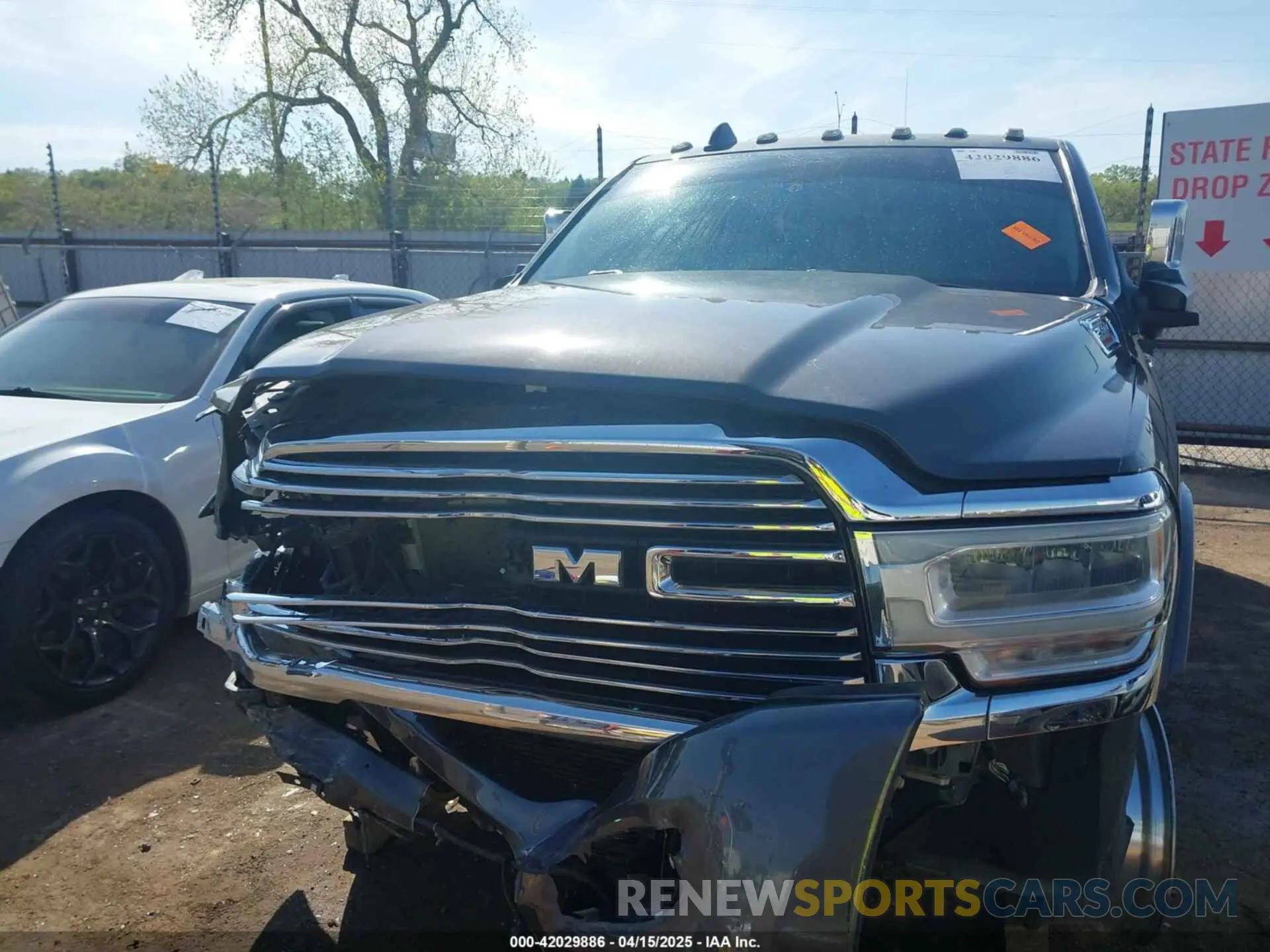 11 Photograph of a damaged car 3C6UR5FL0LG230960 RAM 2500 2020