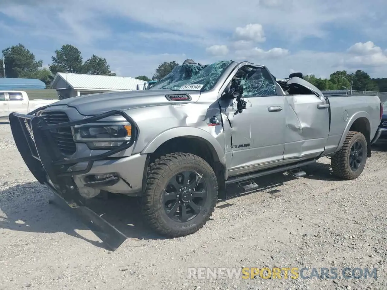 1 Photograph of a damaged car 3C6UR5FL2LG282784 RAM 2500 2020