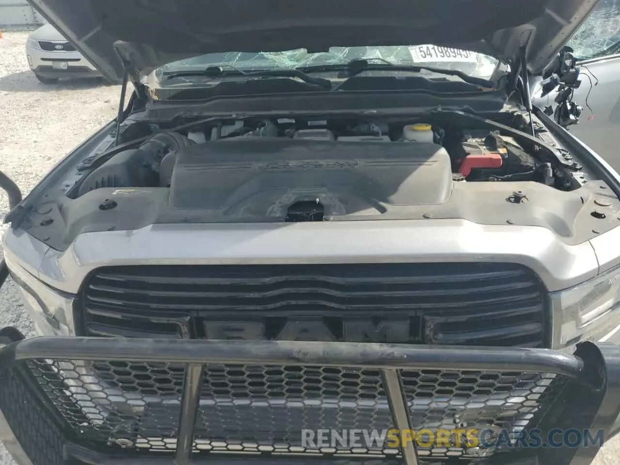 11 Photograph of a damaged car 3C6UR5FL2LG282784 RAM 2500 2020