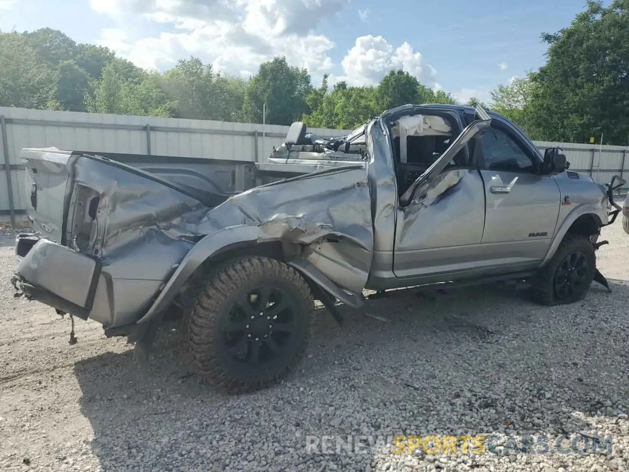 3 Photograph of a damaged car 3C6UR5FL2LG282784 RAM 2500 2020