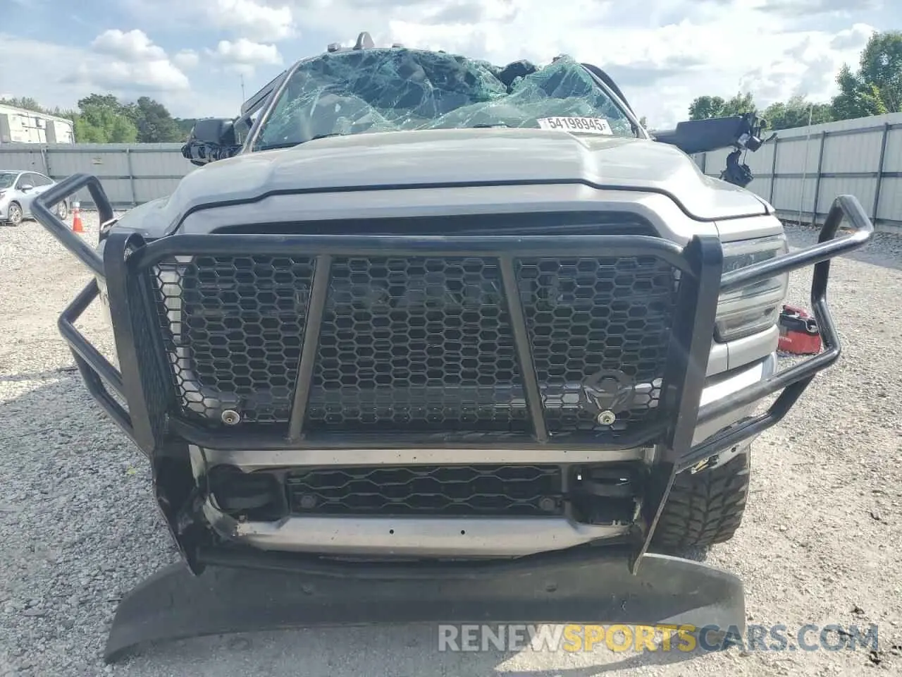 5 Photograph of a damaged car 3C6UR5FL2LG282784 RAM 2500 2020