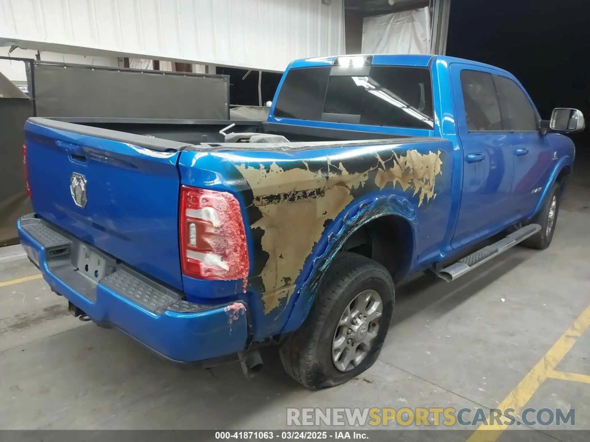 4 Photograph of a damaged car 3C6UR5FL4LG208430 RAM 2500 2020