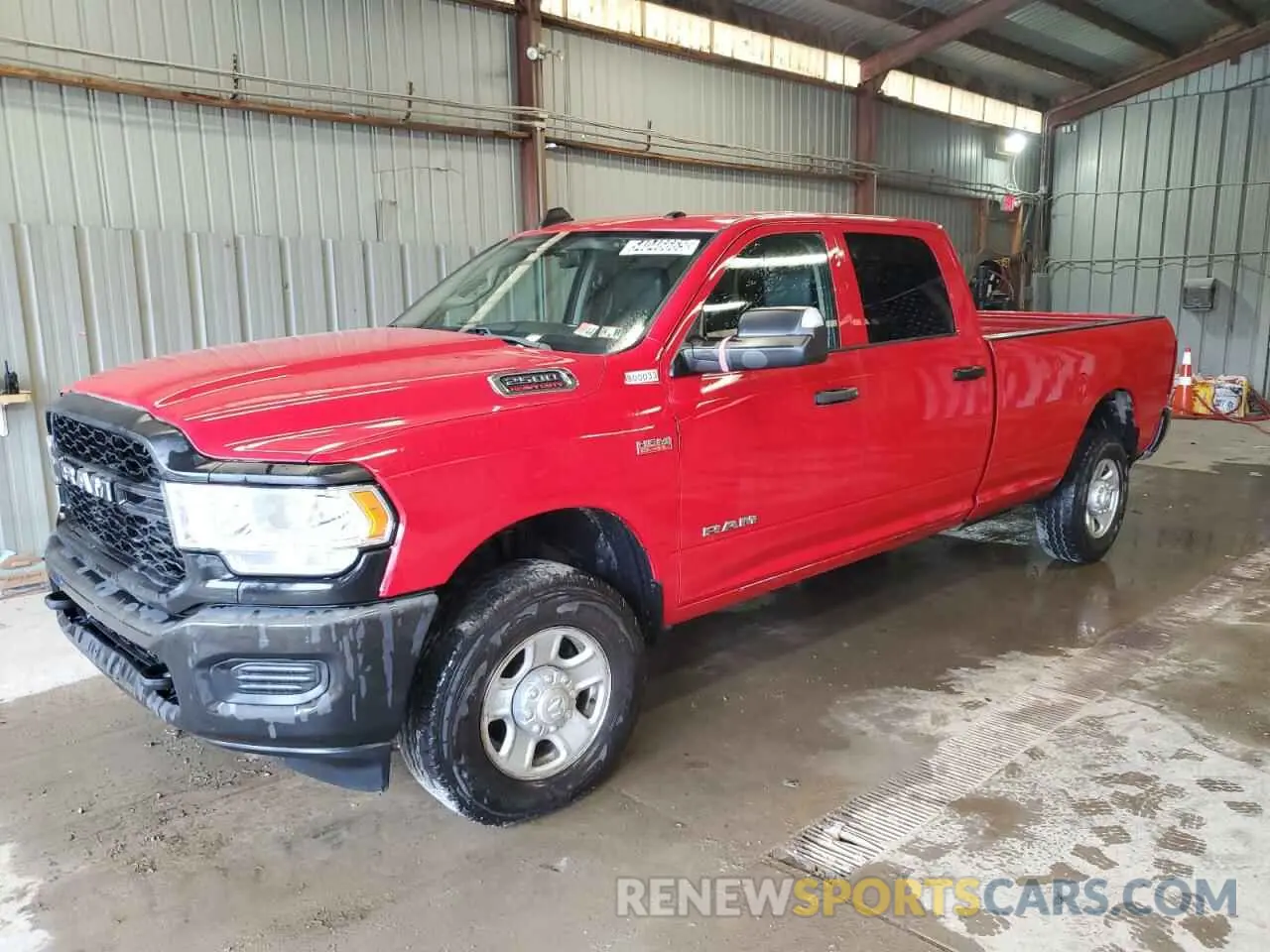 1 Photograph of a damaged car 3C6UR5HJ0LG236754 RAM 2500 2020