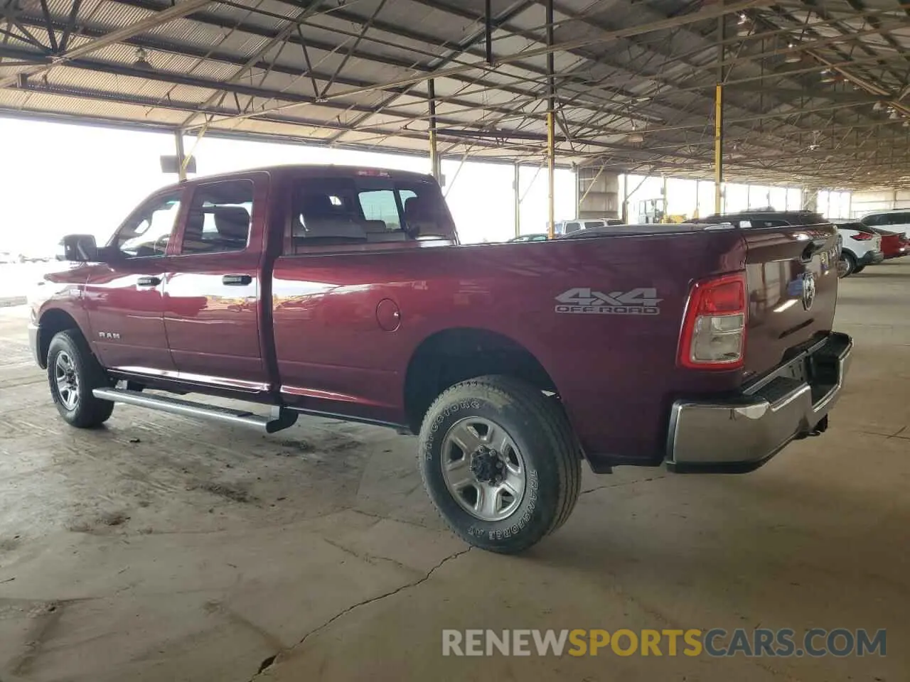 2 Photograph of a damaged car 3C6UR5HJ1LG124979 RAM 2500 2020
