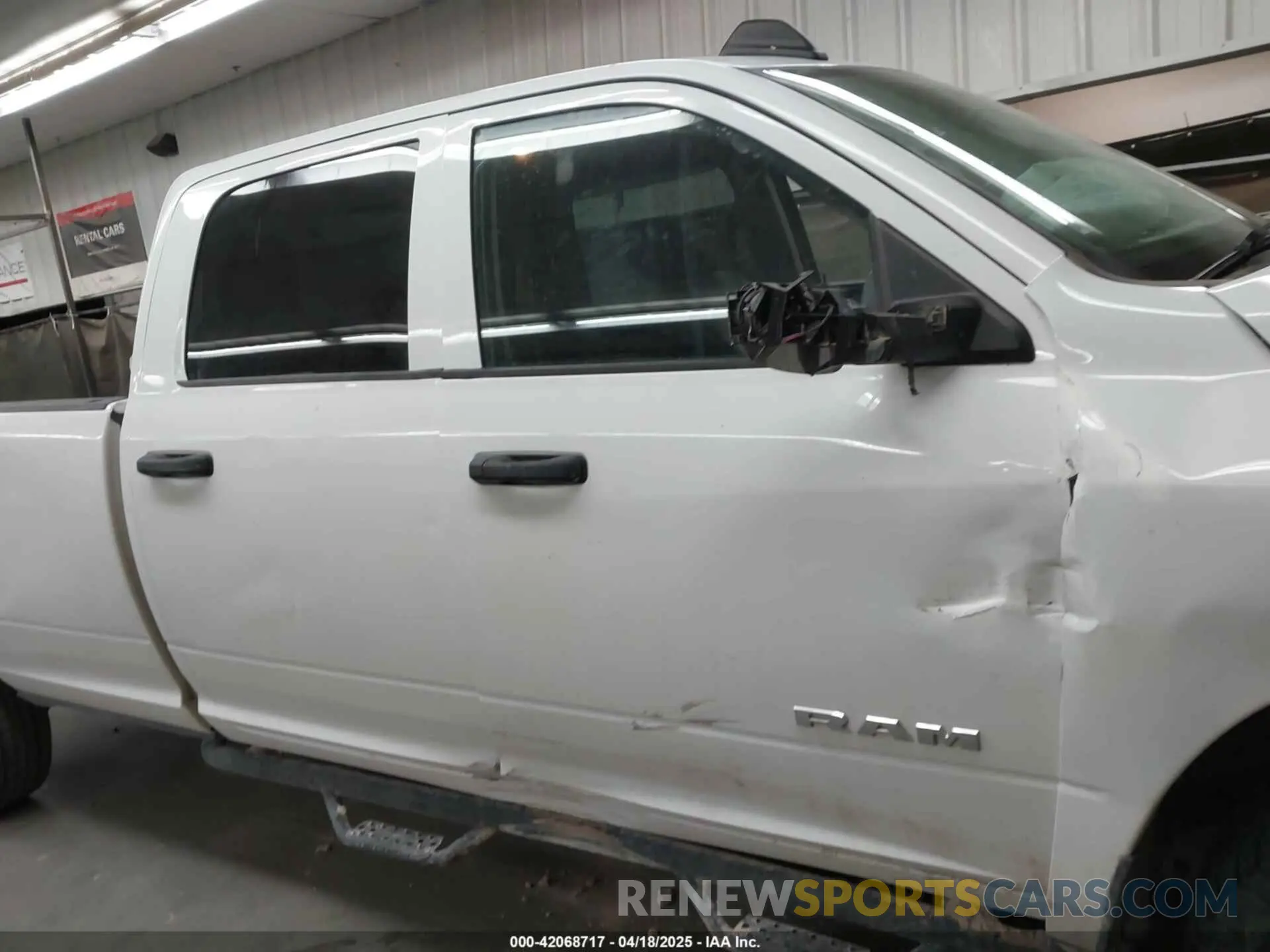 13 Photograph of a damaged car 3C6UR5HJ2LG111495 RAM 2500 2020