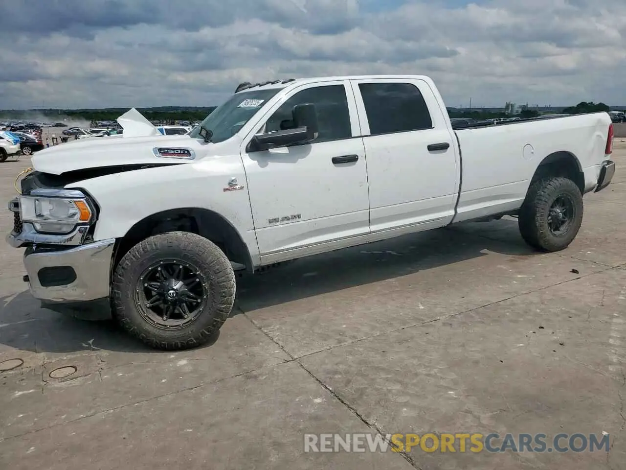 1 Photograph of a damaged car 3C6UR5HLXLG250095 RAM 2500 2020