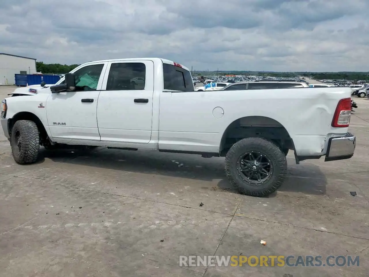 2 Photograph of a damaged car 3C6UR5HLXLG250095 RAM 2500 2020