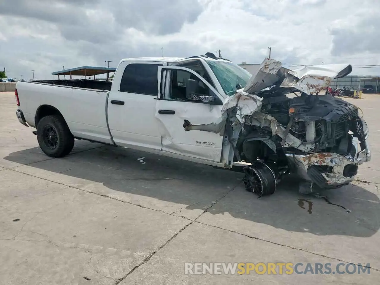 4 Photograph of a damaged car 3C6UR5HLXLG250095 RAM 2500 2020
