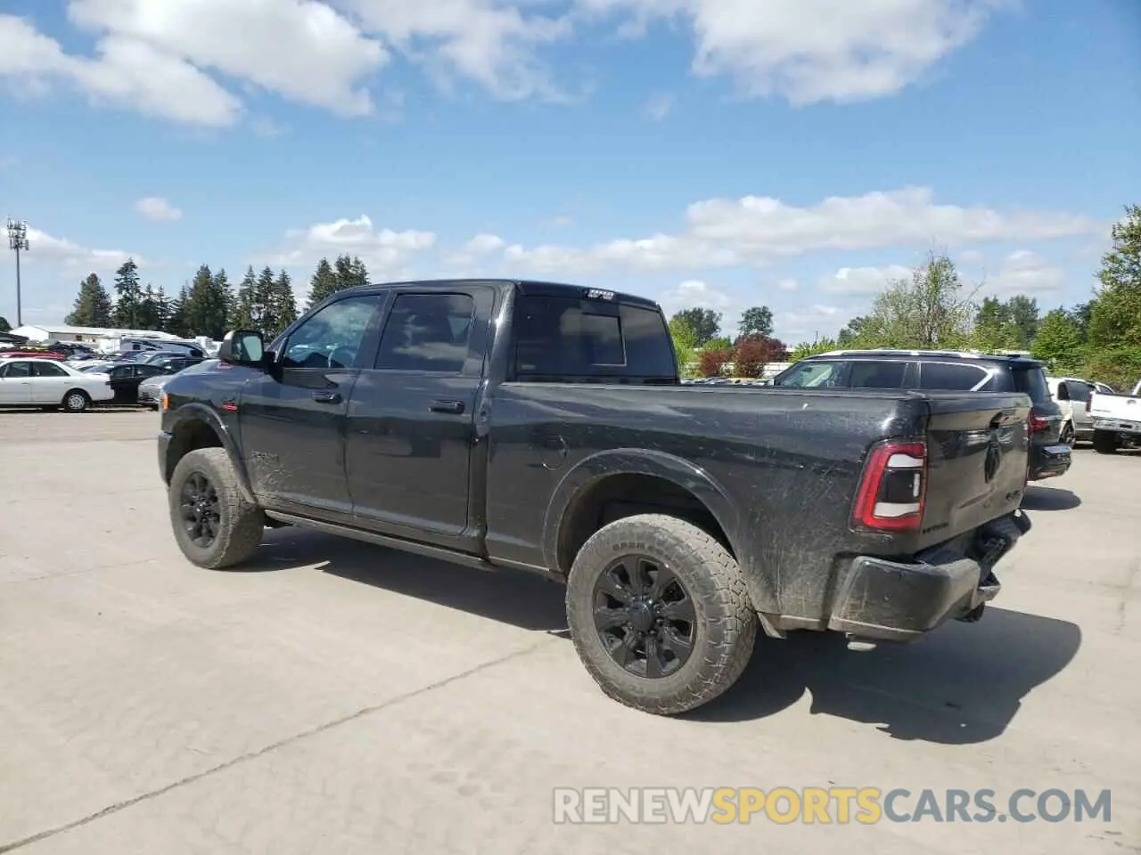 2 Photograph of a damaged car 3C6UR5SL0LG273751 RAM 2500 2020
