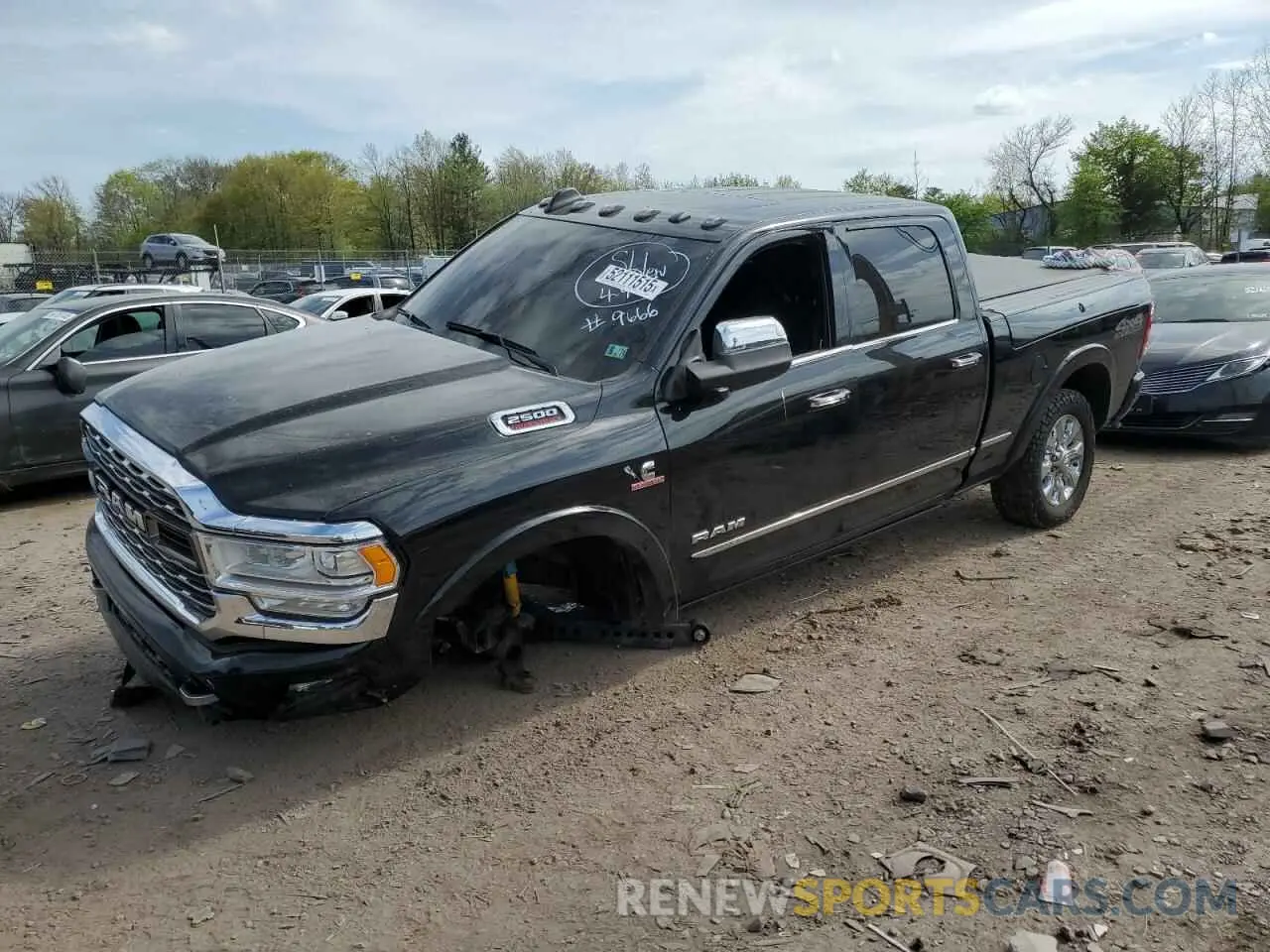 1 Photograph of a damaged car 3C6UR5SL1LG109666 RAM 2500 2020
