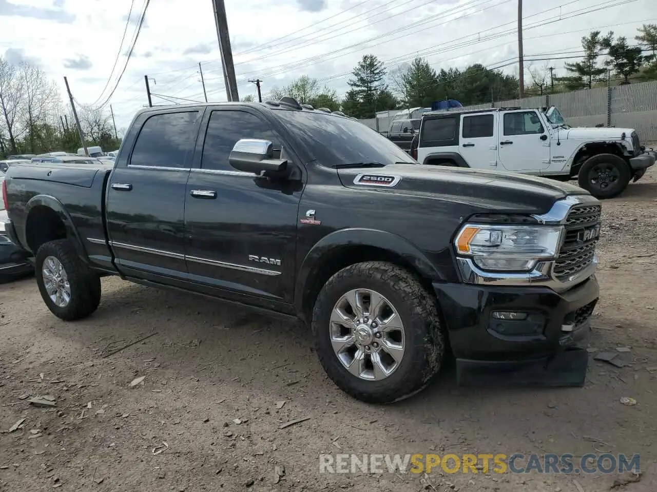 4 Photograph of a damaged car 3C6UR5SL1LG109666 RAM 2500 2020