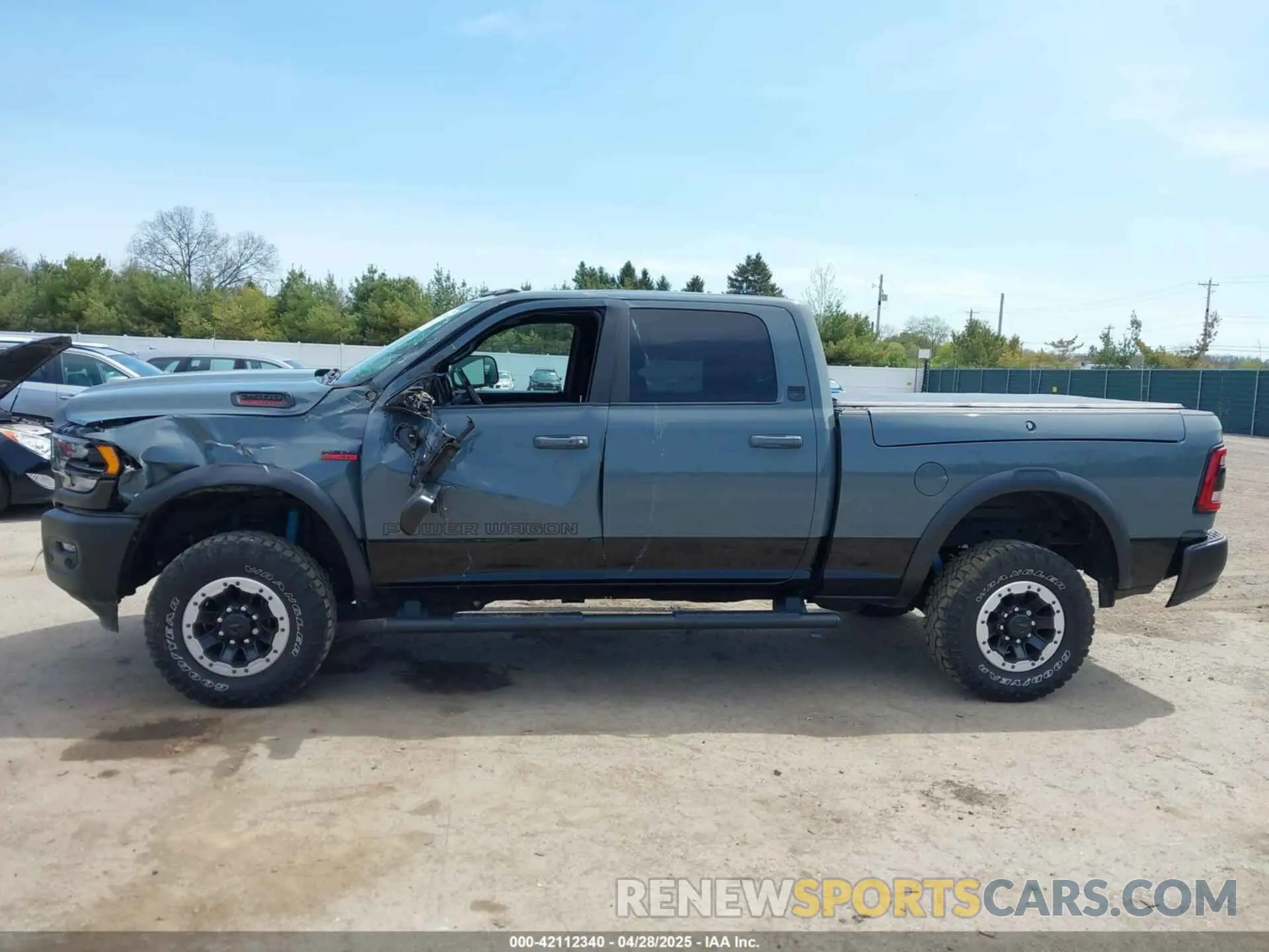 14 Photograph of a damaged car 3C6TR5EJ0MG575323 RAM 2500 2021