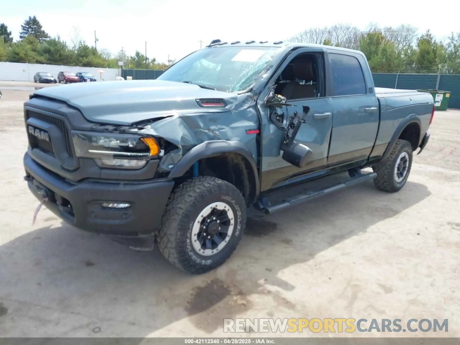 2 Photograph of a damaged car 3C6TR5EJ0MG575323 RAM 2500 2021