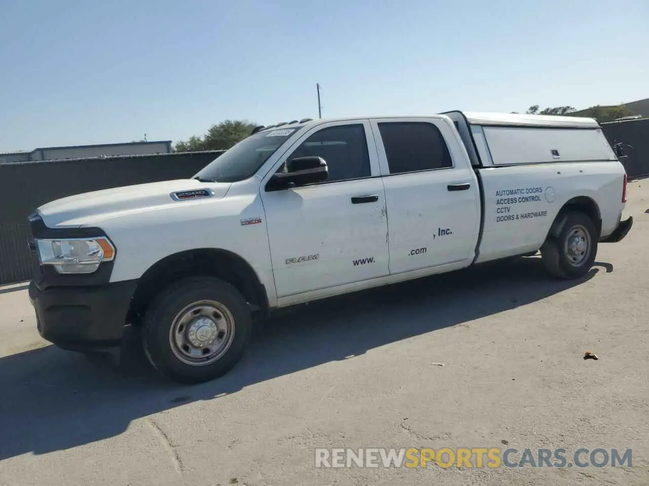 1 Photograph of a damaged car 3C6UR4HJ1MG648385 RAM 2500 2021