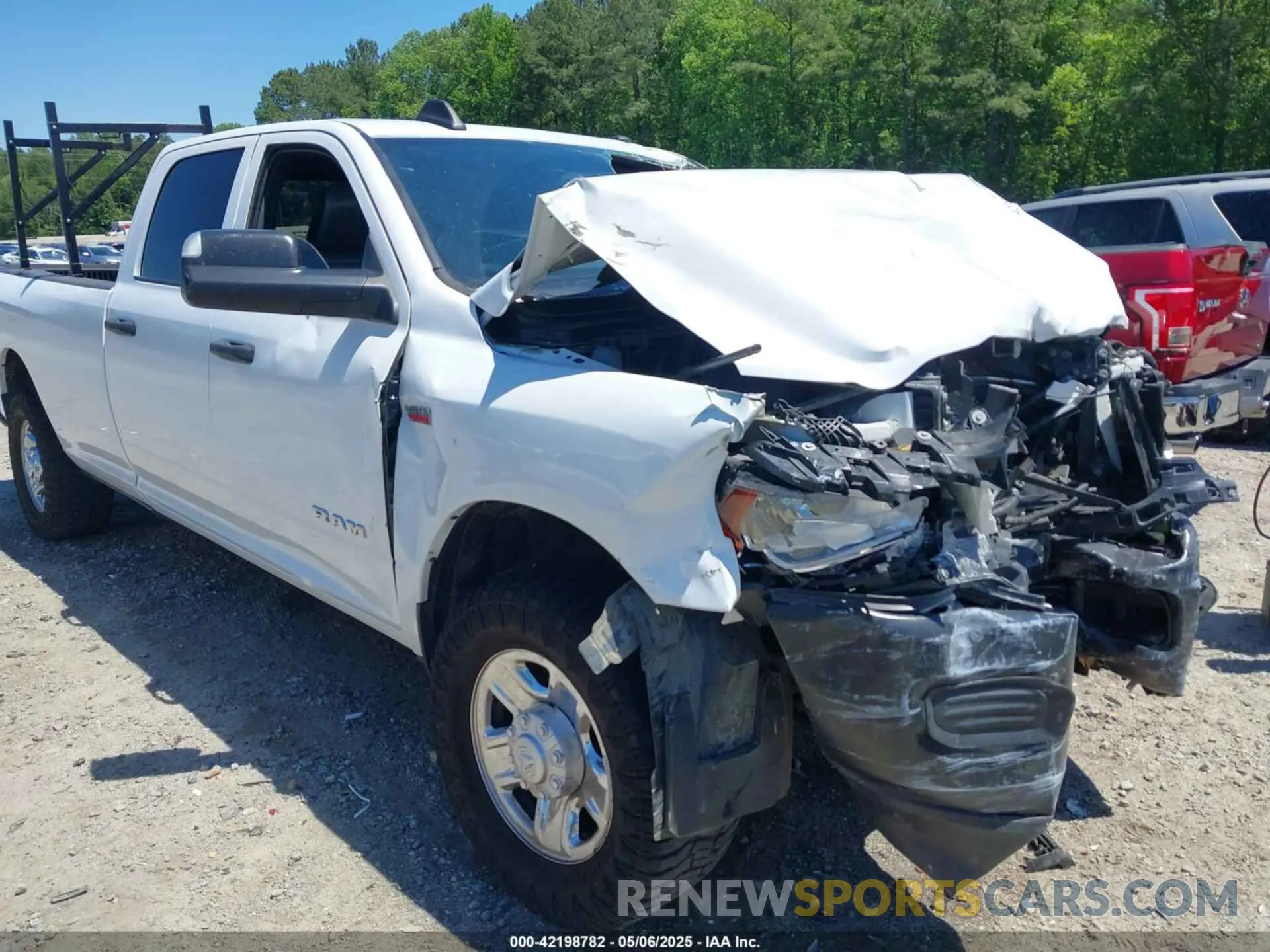 19 Photograph of a damaged car 3C6UR4HJXMG674094 RAM 2500 2021