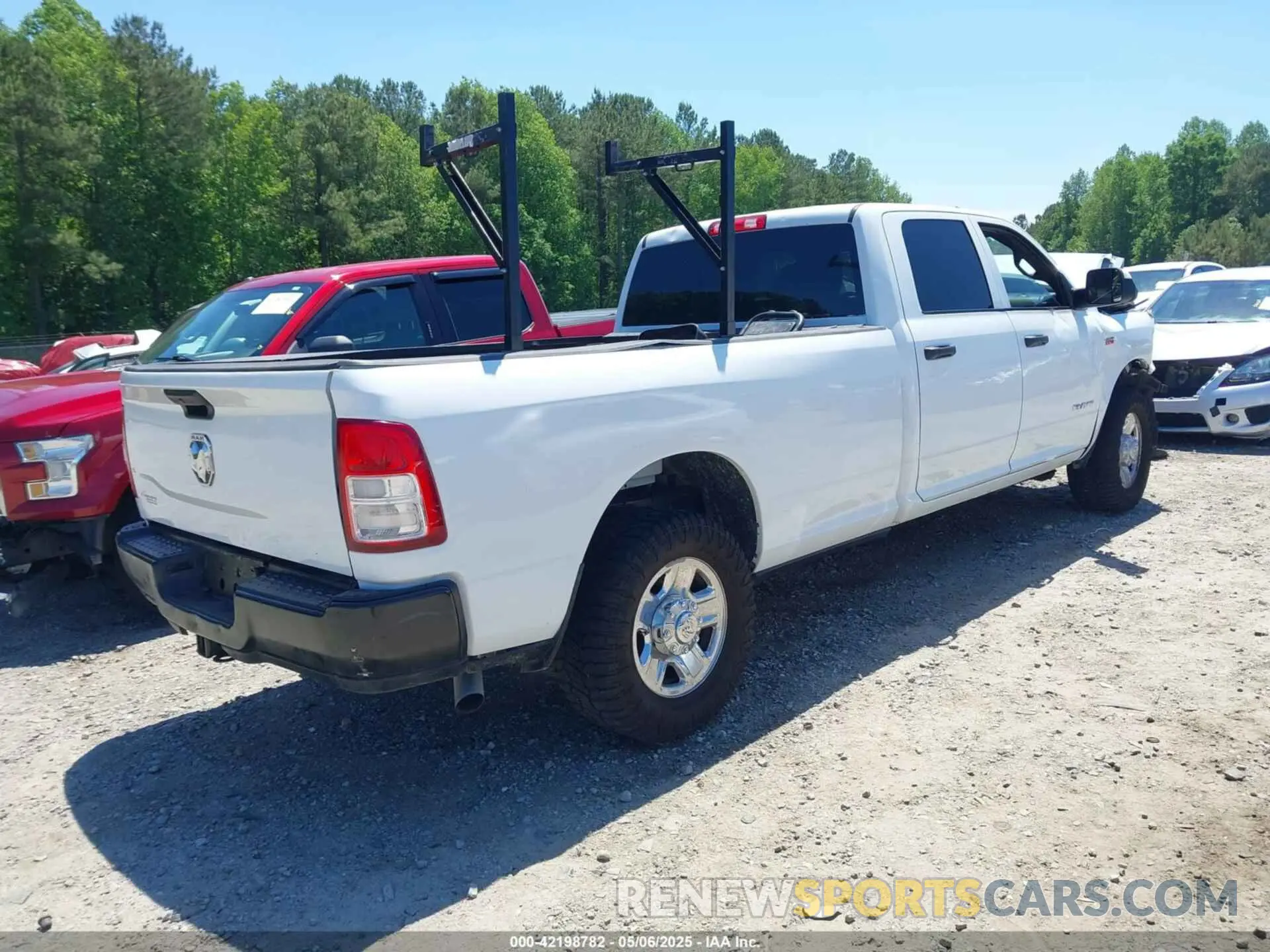 4 Photograph of a damaged car 3C6UR4HJXMG674094 RAM 2500 2021