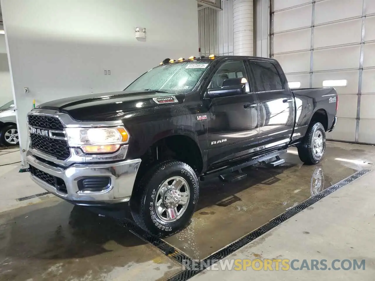 1 Photograph of a damaged car 3C6UR5CJ1MG637738 RAM 2500 2021