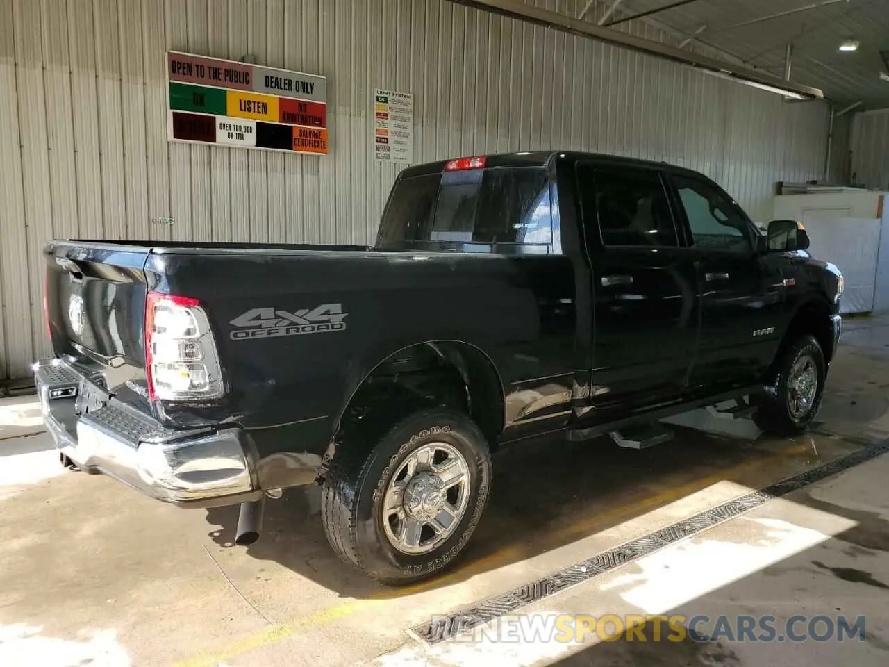 3 Photograph of a damaged car 3C6UR5CJ1MG637738 RAM 2500 2021