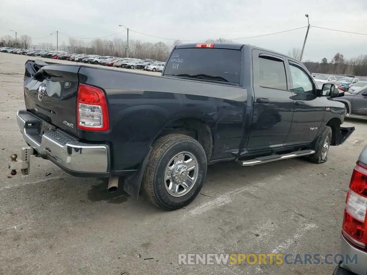 3 Photograph of a damaged car 3C6UR5CJ2MG561219 RAM 2500 2021