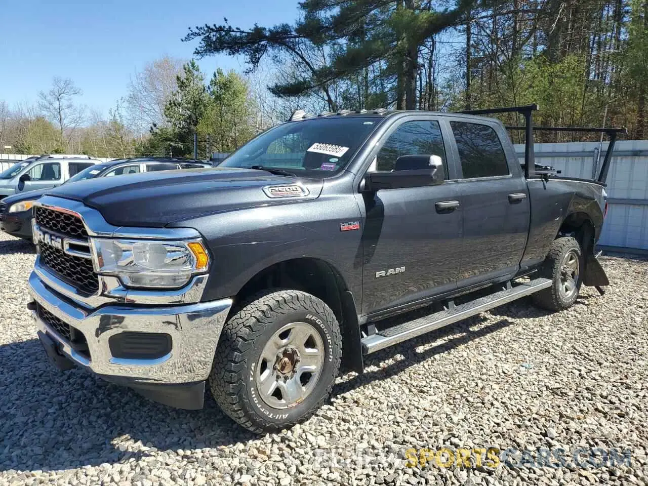 1 Photograph of a damaged car 3C6UR5CJ2MG573130 RAM 2500 2021