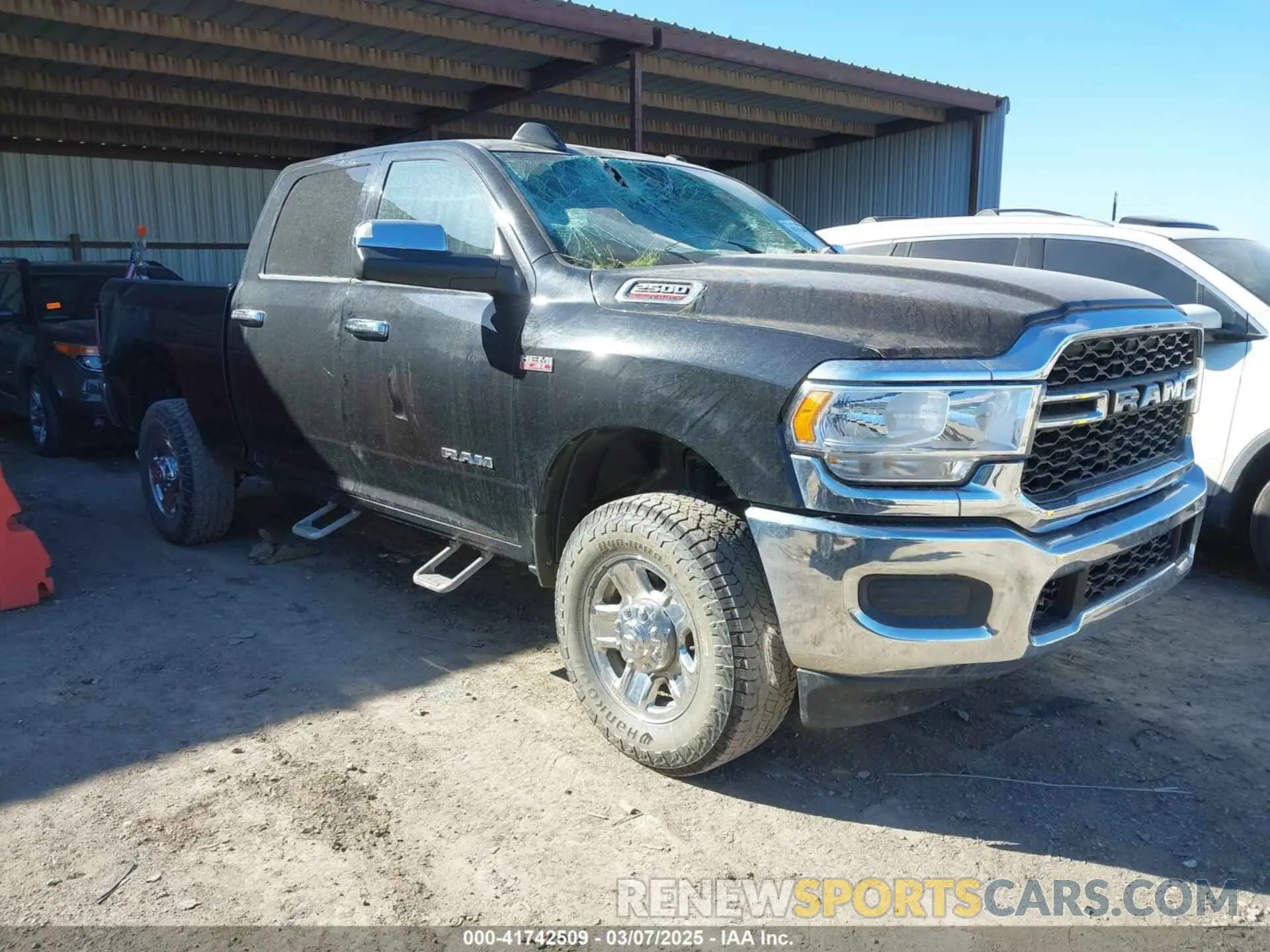 1 Photograph of a damaged car 3C6UR5CJ2MG573337 RAM 2500 2021