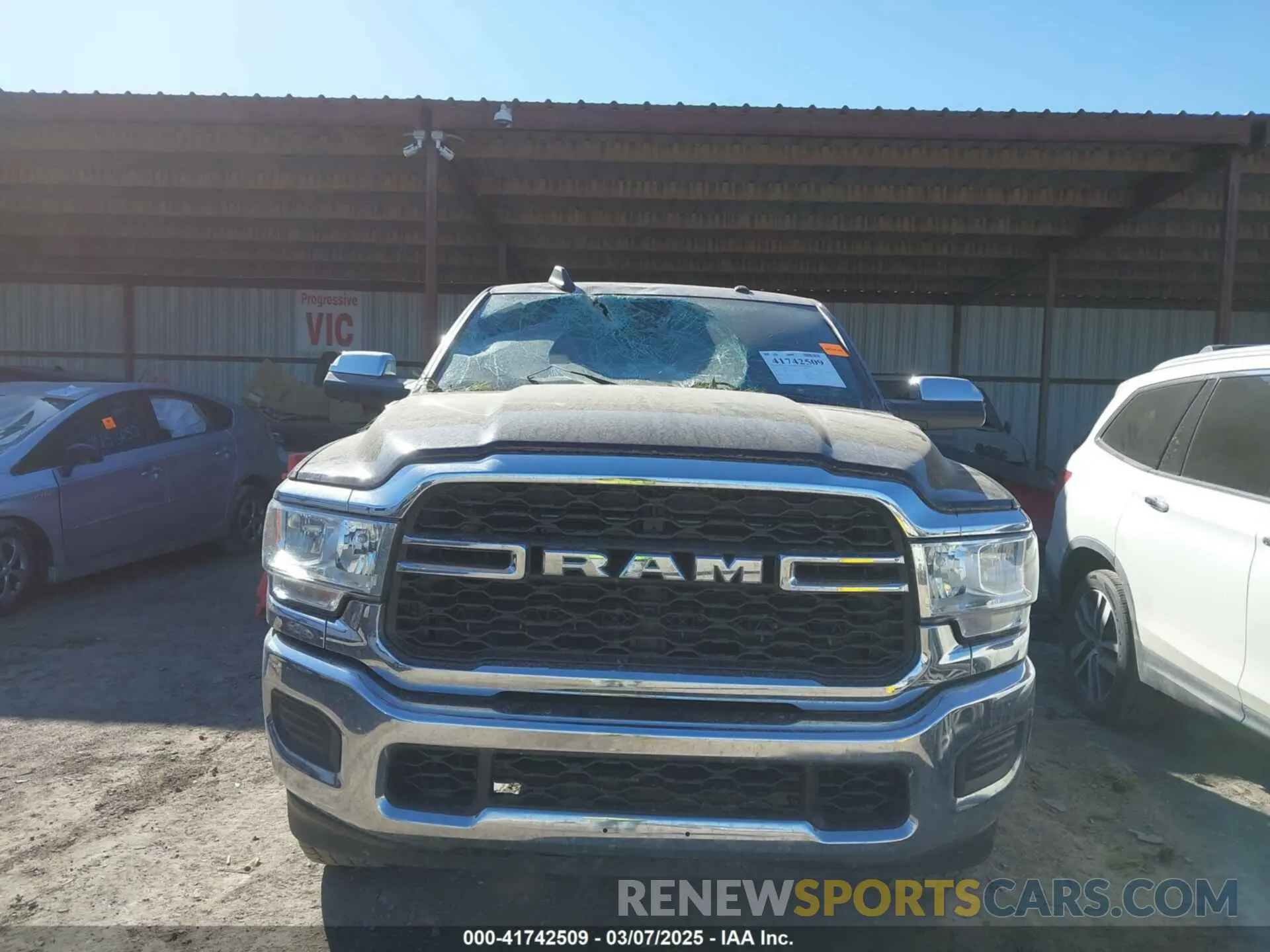 13 Photograph of a damaged car 3C6UR5CJ2MG573337 RAM 2500 2021