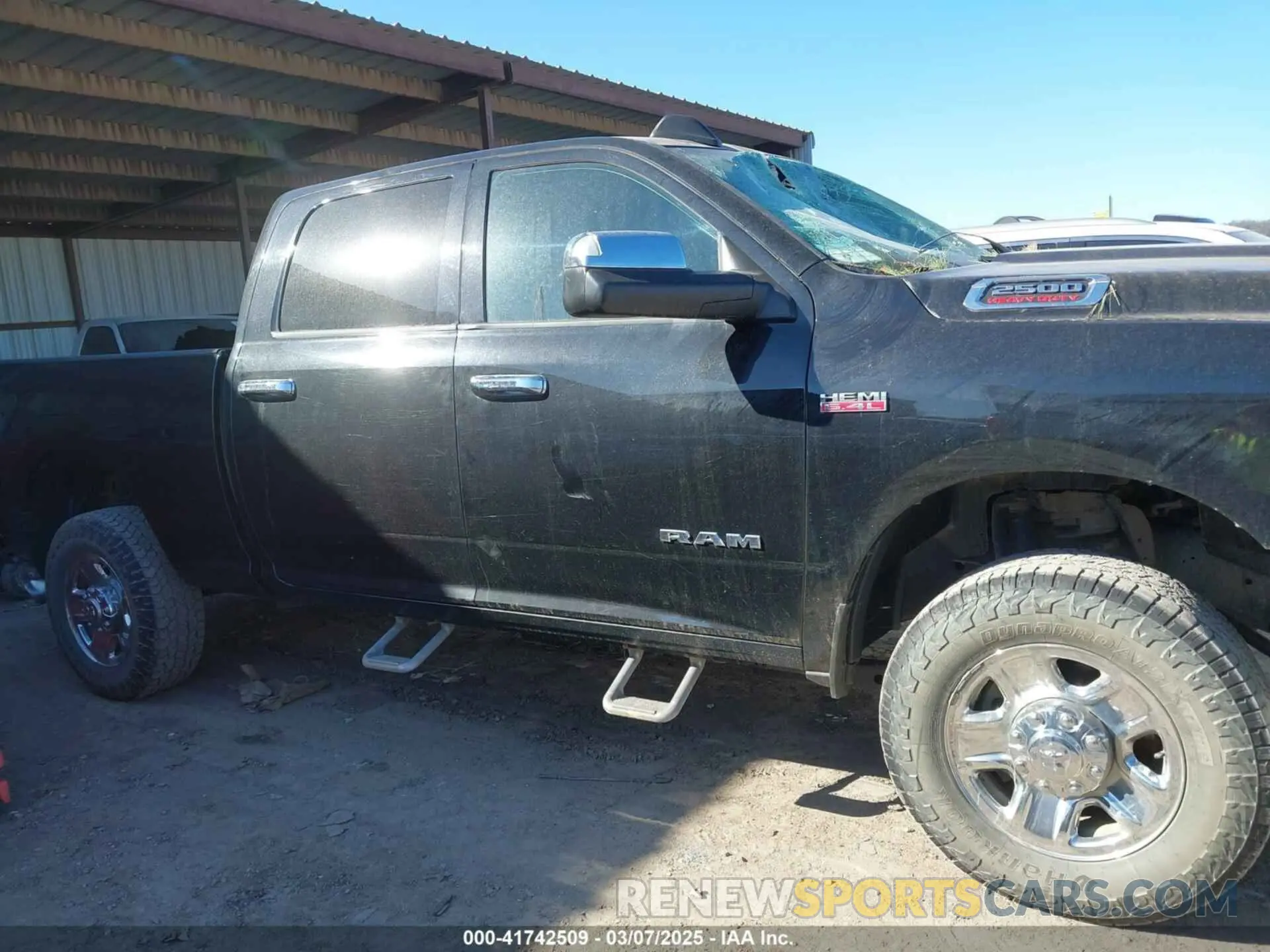 14 Photograph of a damaged car 3C6UR5CJ2MG573337 RAM 2500 2021