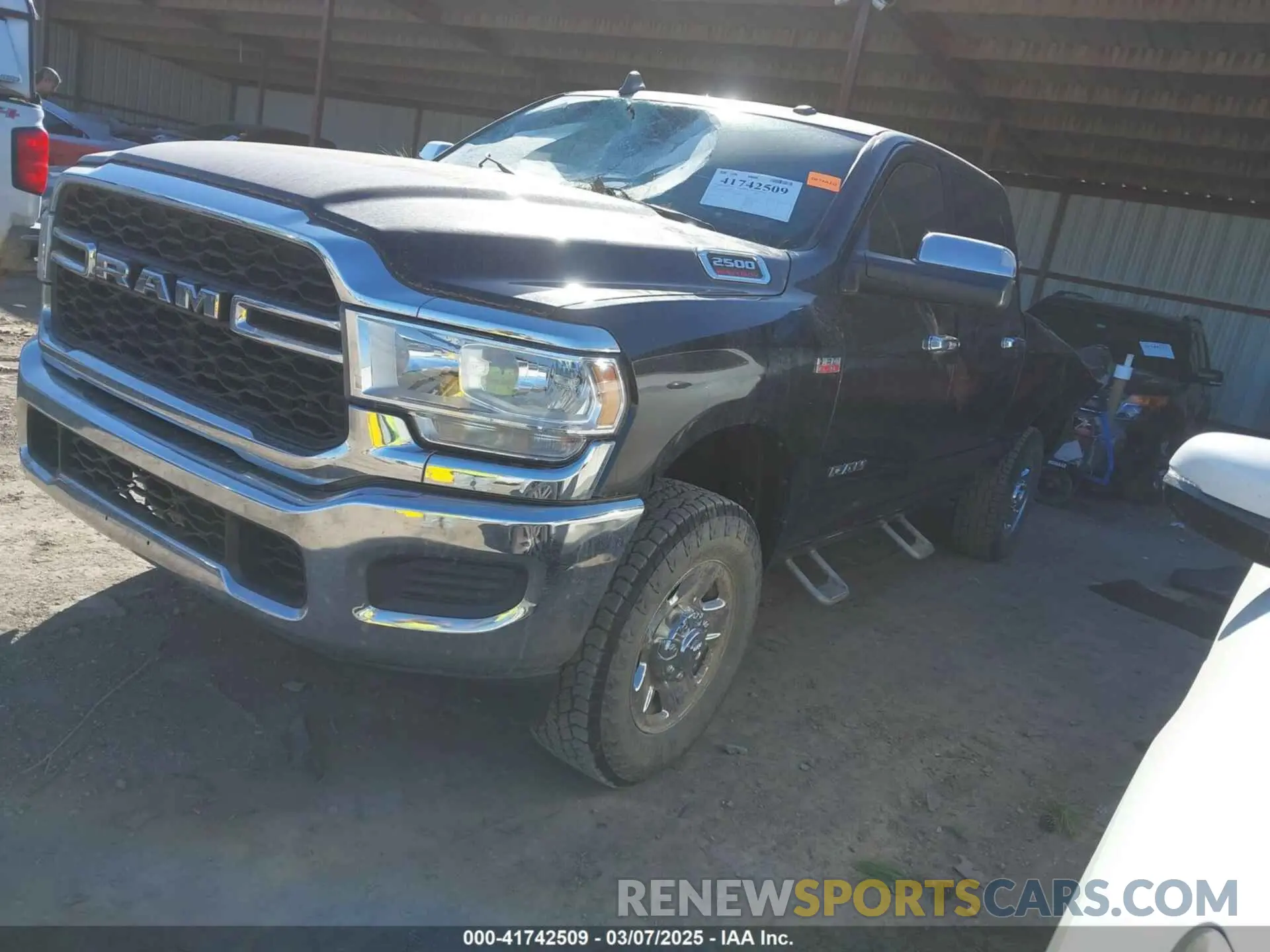 2 Photograph of a damaged car 3C6UR5CJ2MG573337 RAM 2500 2021
