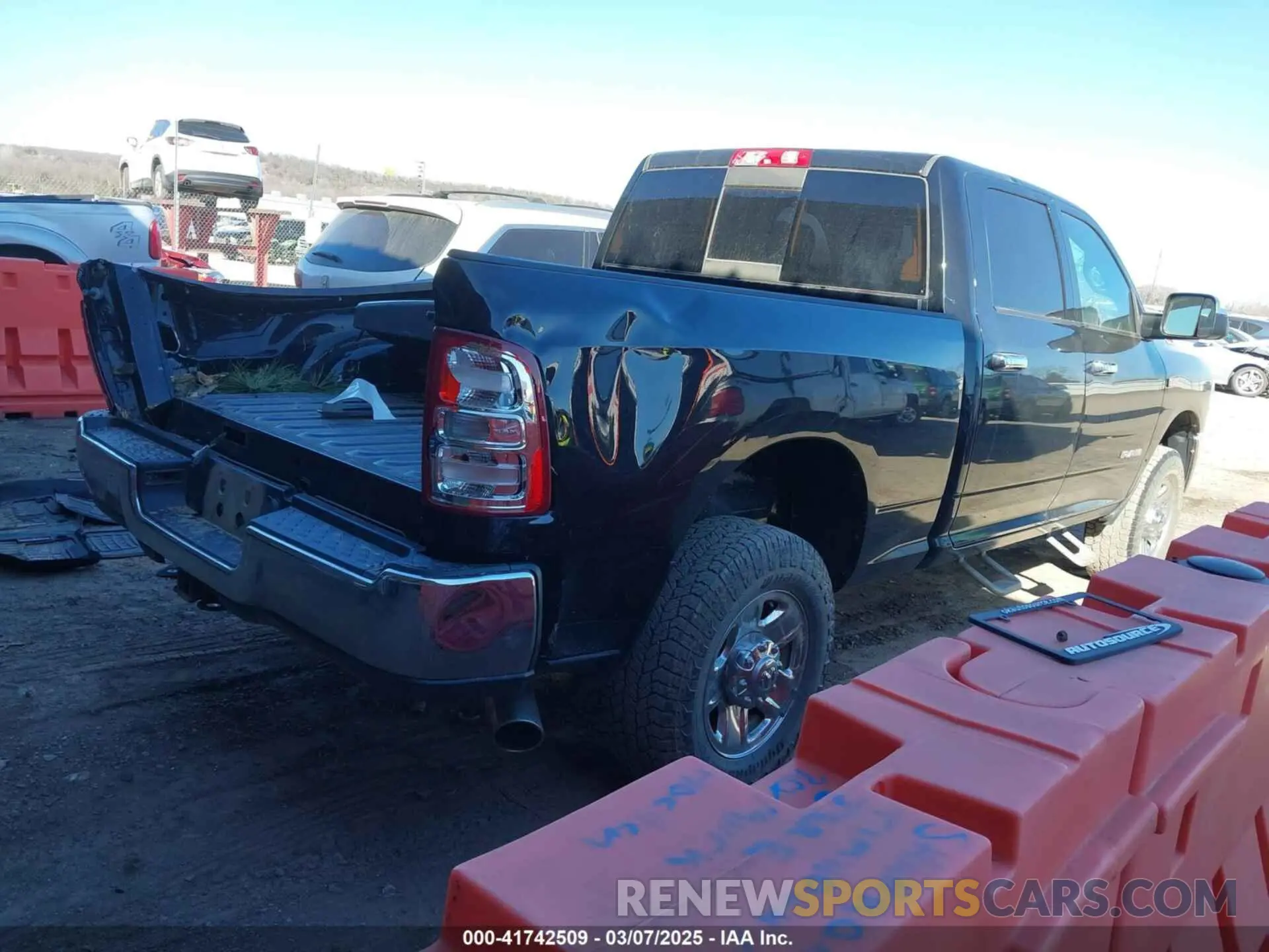 4 Photograph of a damaged car 3C6UR5CJ2MG573337 RAM 2500 2021