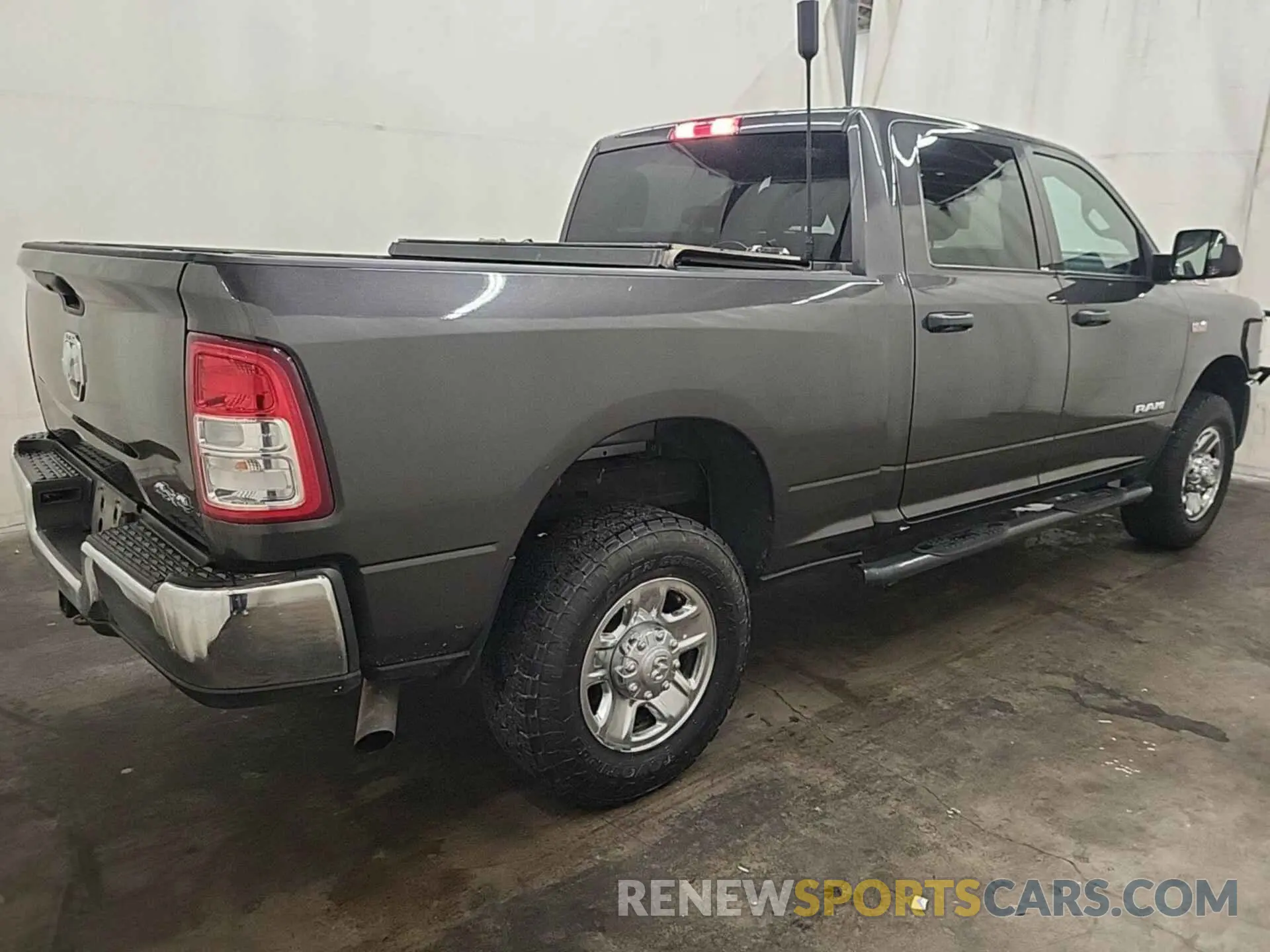 2 Photograph of a damaged car 3C6UR5CJ3MG590924 RAM 2500 2021