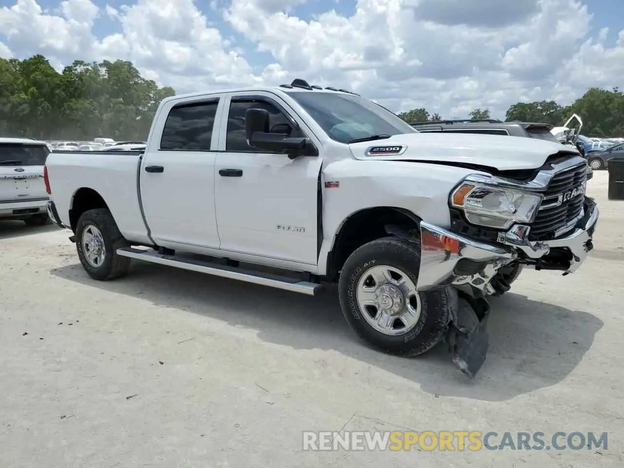 4 Photograph of a damaged car 3C6UR5CJ4MG535303 RAM 2500 2021