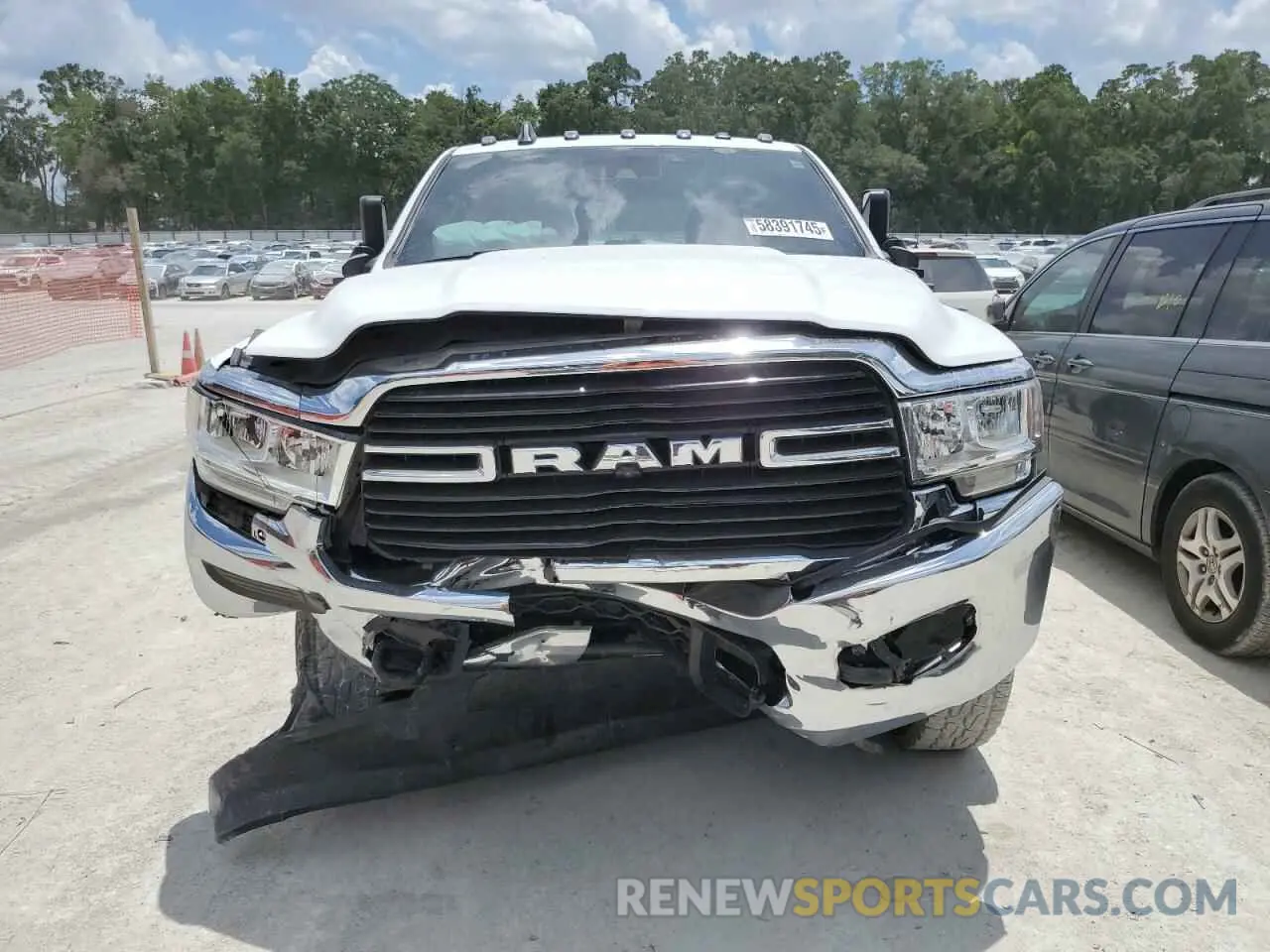 5 Photograph of a damaged car 3C6UR5CJ4MG535303 RAM 2500 2021