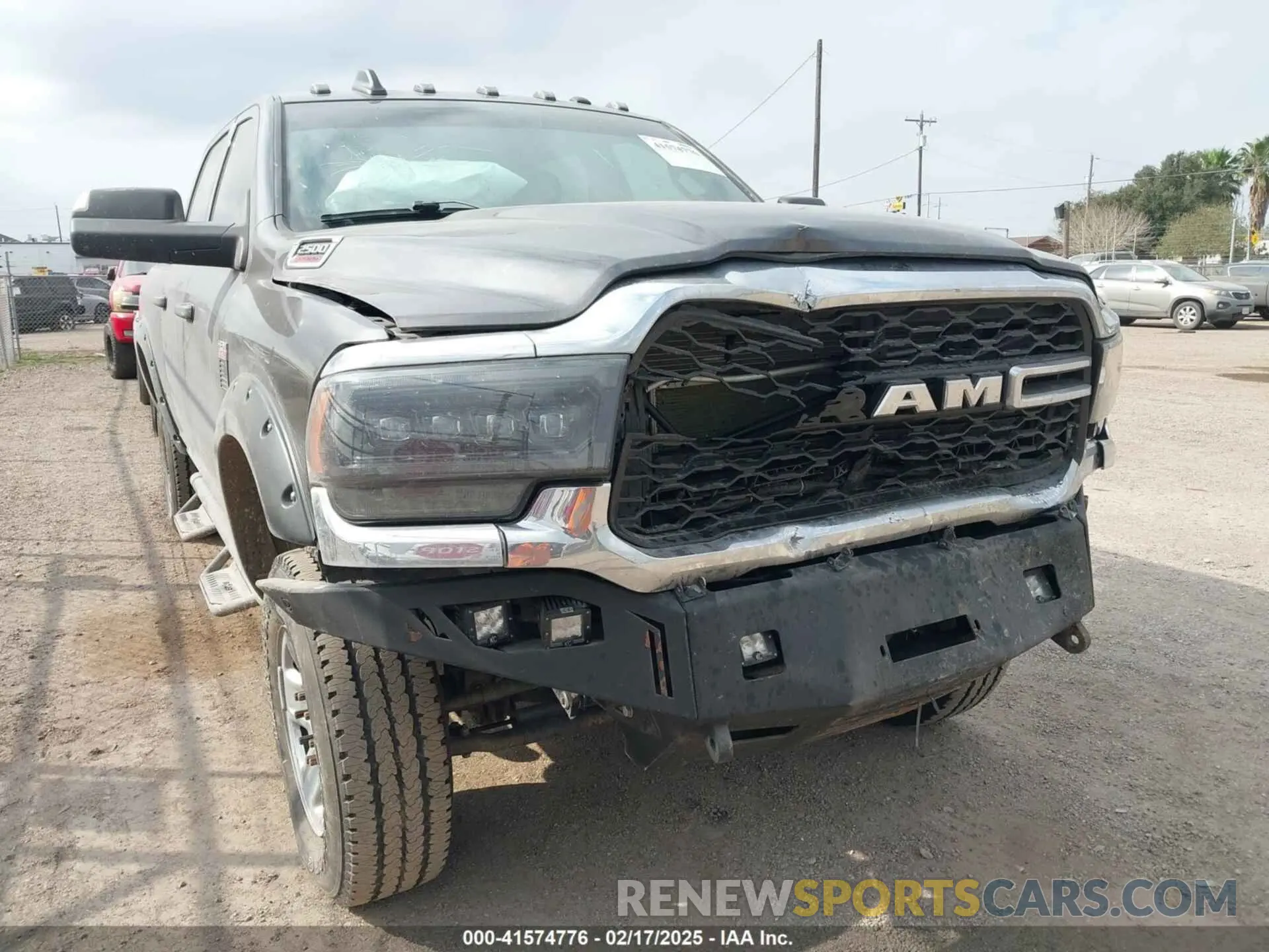 1 Photograph of a damaged car 3C6UR5CJ7MG572703 RAM 2500 2021
