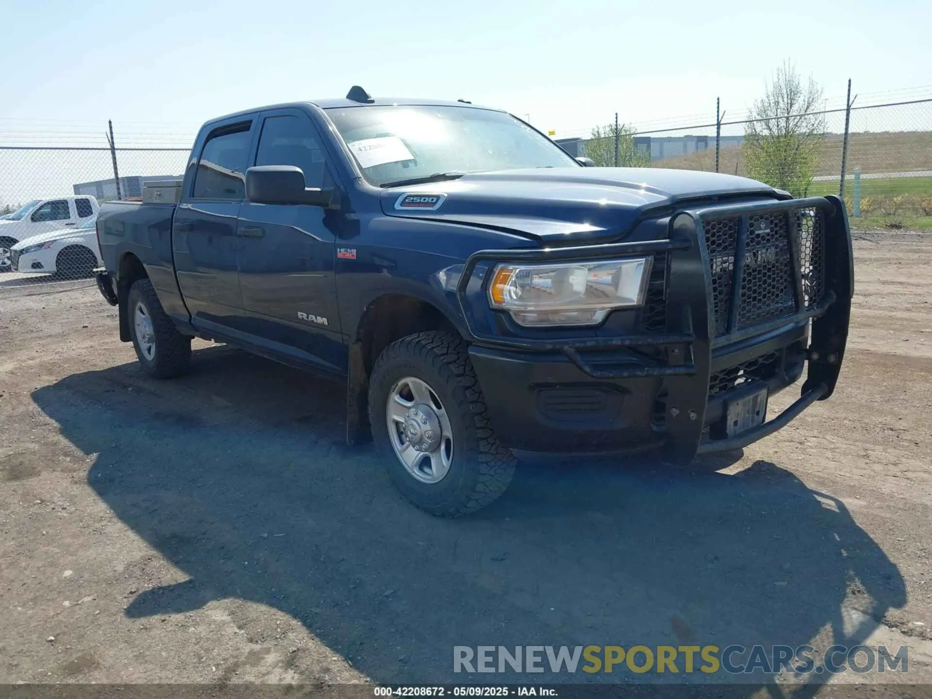1 Photograph of a damaged car 3C6UR5CJ8MG656626 RAM 2500 2021