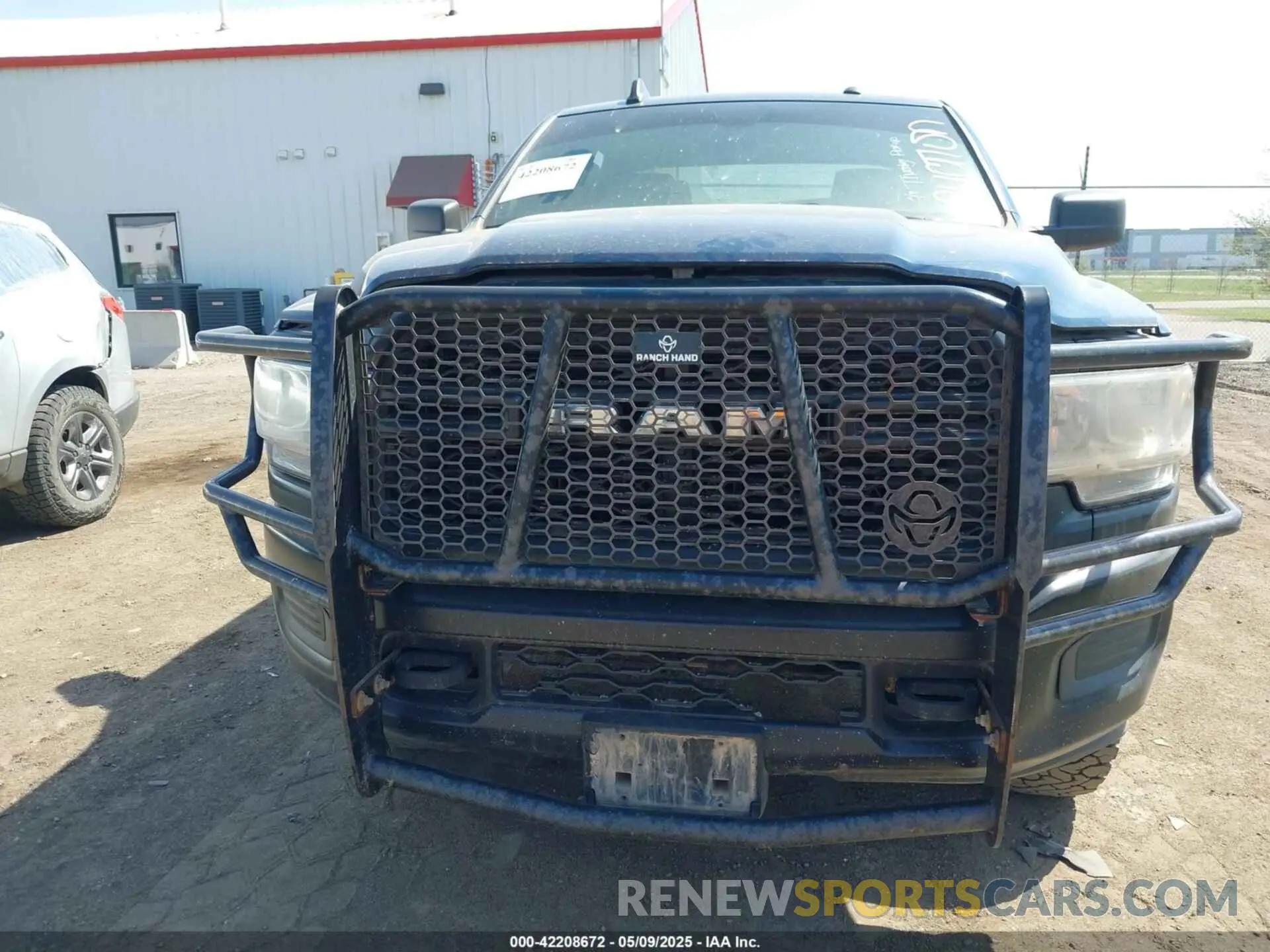 13 Photograph of a damaged car 3C6UR5CJ8MG656626 RAM 2500 2021