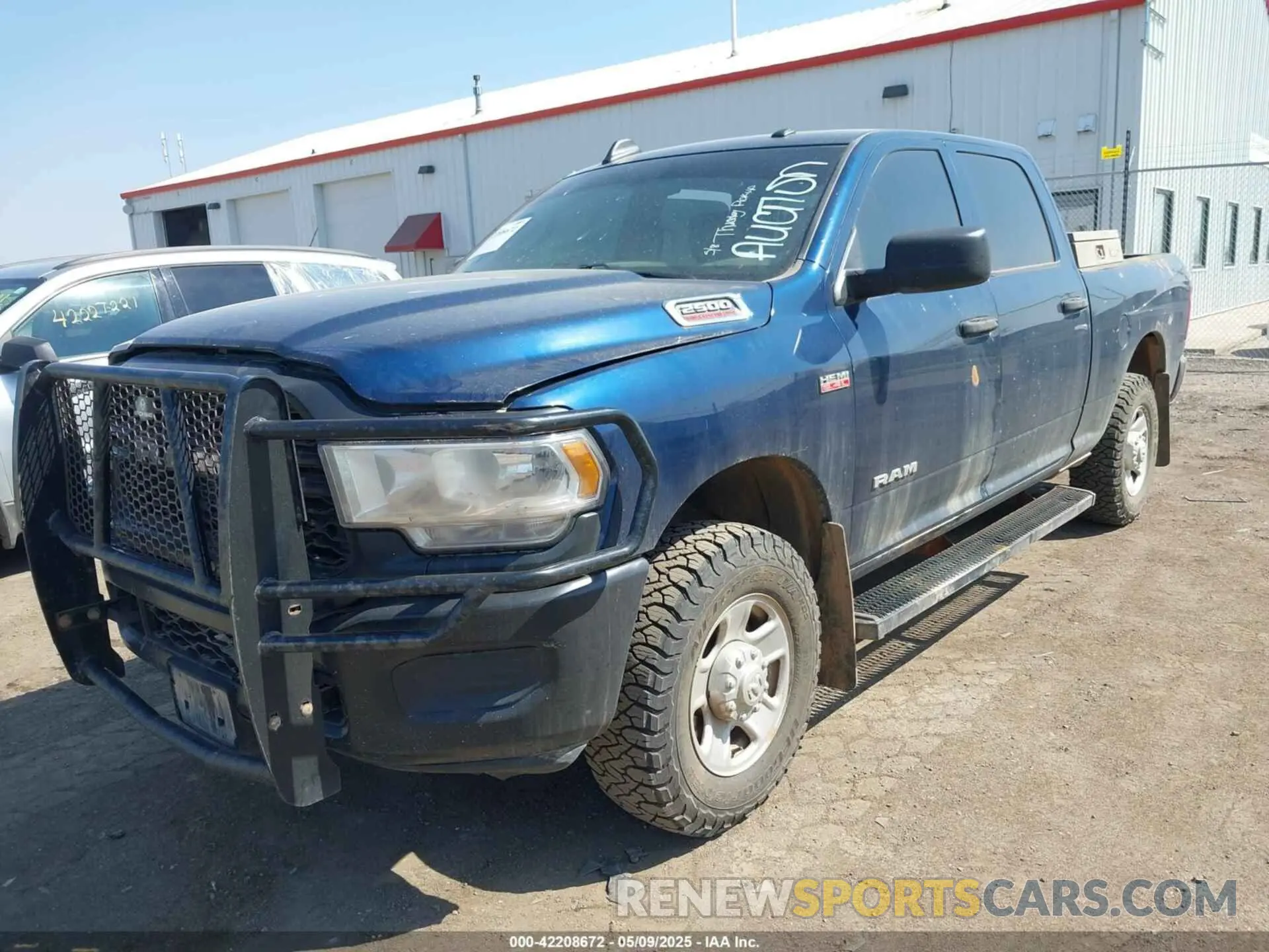 2 Photograph of a damaged car 3C6UR5CJ8MG656626 RAM 2500 2021