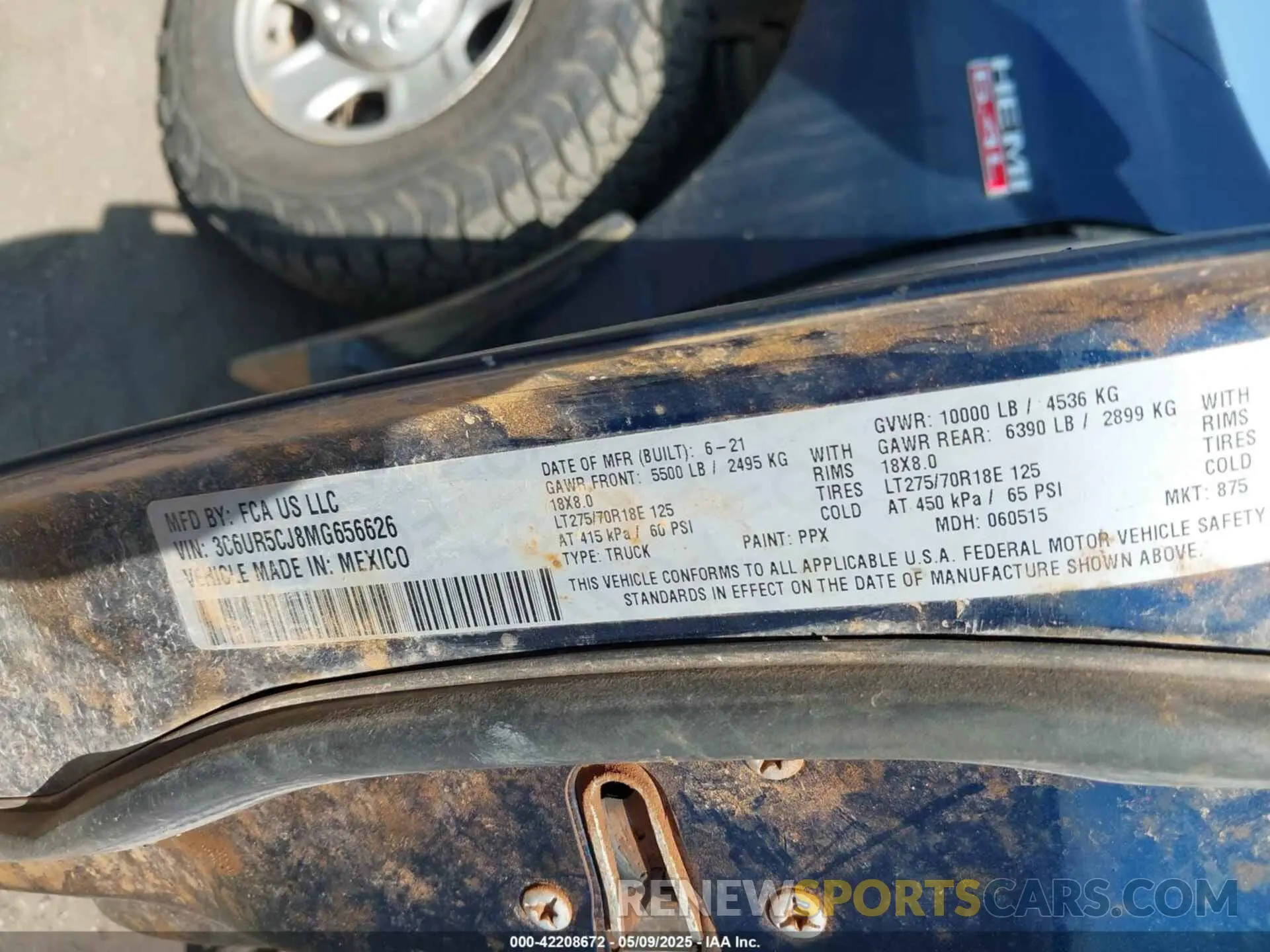 9 Photograph of a damaged car 3C6UR5CJ8MG656626 RAM 2500 2021